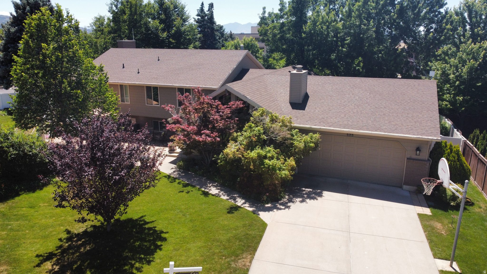 This exceptional home is a must- see on the coveted east bench of Bountiful! Tucked away in a quiet cul-de-sac with no backyard neighbors, it offers both privacy and tranquility. This home has been meticulously maintained and is in immaculate condition.  This home features over 5000 ft2 of thoughtfully designed living space. Enjoy generous gathering areas and the added flexibility of a daylight basement ideal for multi-generational living. As an added bonus, this home features backup generators including a Generac that will keep the entire home functioning in an outage.