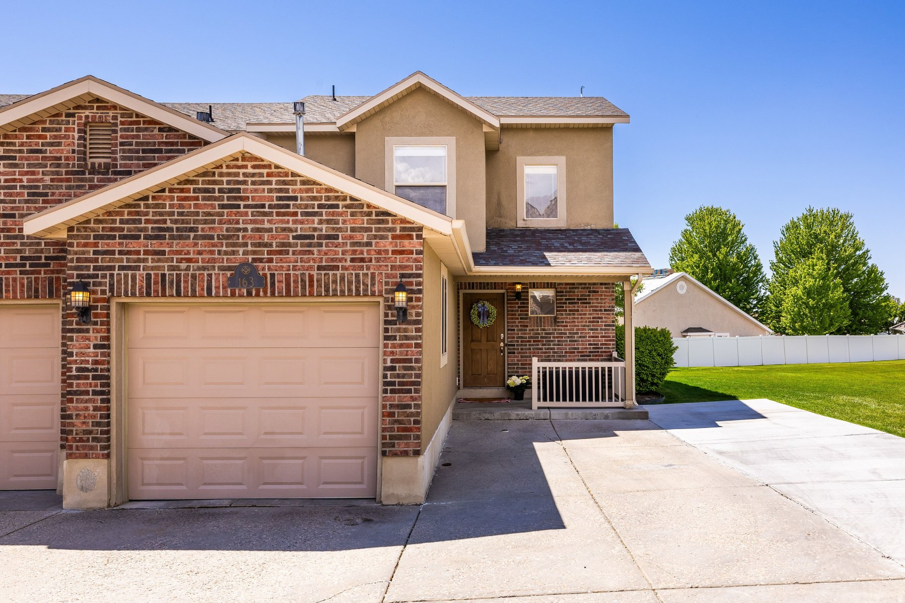 One of the best-maintained homes in the community! This clean and well cared for end-unit townhome sits at the end of a quiet cul-de-sac, offering added privacy and minimal traffic. Something unique about the property is that it includes an extra poured parking pad for additional vehicle parking. Inside, you'll find an open and inviting layout highlighted by a large granite island, open living areas, and an abundance of natural light. The extra tall garage provides valuable additional storage space, while the spacious primary suite features a walk-in closet and plenty of room to unwind. A truly standout property with upgrades and features that are hard to find in this community.