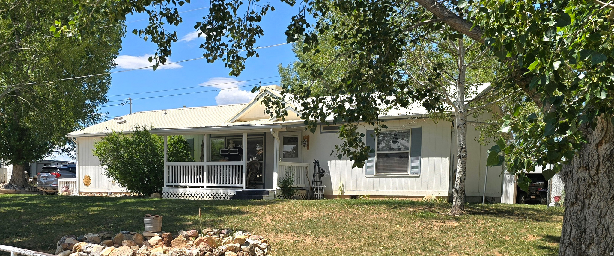 This 3 bedroom 2 bath home also has a Den or office space or possible 4th bedroom. Beautiful mature trees and is down a dead road. There is also a storage shed that has a bathroom and kitchen in it perfect for that man cave!