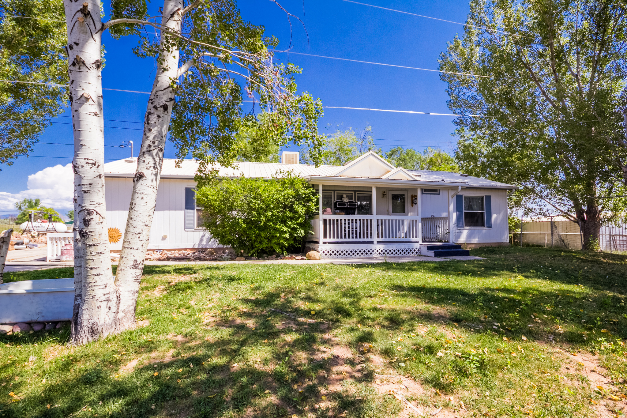 This 3 bedroom 2 bath home also has a Den or office space or possible 4th bedroom. Beautiful mature trees and is down a dead road. There is also a storage shed that has a bathroom and kitchen in it perfect for that man cave!