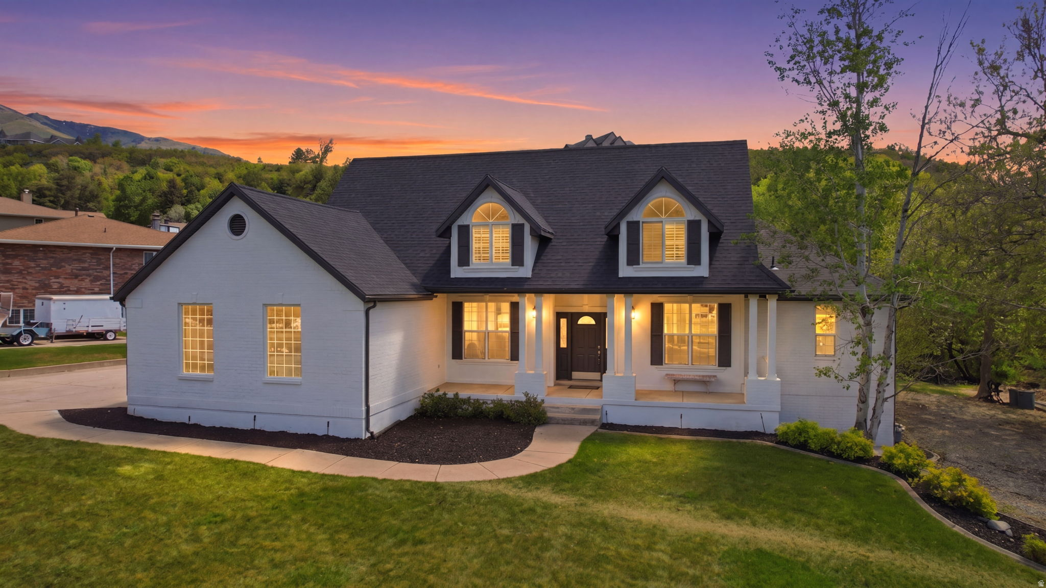 Welcome to one of South Ogden's most unique properties. Situated on nearly .85 acres, this fully updated custom home offers over 5,000 square feet of living space, a rare park-like backyard setting, and amenities that are difficult to find in one property. The open-concept main level features luxury vinyl plank flooring, abundant natural light, and spacious living areas designed for gathering and entertaining. The updated kitchen offers granite countertops, ample cabinetry, generous workspace, and flows seamlessly into the surrounding living spaces. A cozy gas fireplace anchors the family room, while the spacious main-level primary suite provides comfort and convenience with dual vanities. With 6 bedrooms, multiple gathering spaces, and a finished basement featuring a large family/game room, there is plenty of room for family, guests, hobbies, and entertaining. The backyard is truly a standout feature. A creek winds through the property, creating a beautiful park-like setting with mature trees, lush landscaping, a heated in-ground pool with automatic cover, expansive deck, and a charming gazebo overlooking the water. Whether hosting friends and family or enjoying a quiet evening outdoors, this backyard offers something very few properties can match. Recent improvements include a roof installed three years ago, a tankless water heater with hot water recirculation system installed around 202 and extensive updates throughout. Additional features include an attached two-car garage, detached one-car garage, and abundant storage. Conveniently located near schools, shopping, dining, outdoor recreation, Weber State University, and local hospitals, this exceptional property combines space, updates, and a one-of-a-kind setting rarely available in South Ogden. Square footage figures are provided as a courtesy estimate only and were obtained from county records. Buyer is advised to obtain an independant measurement.