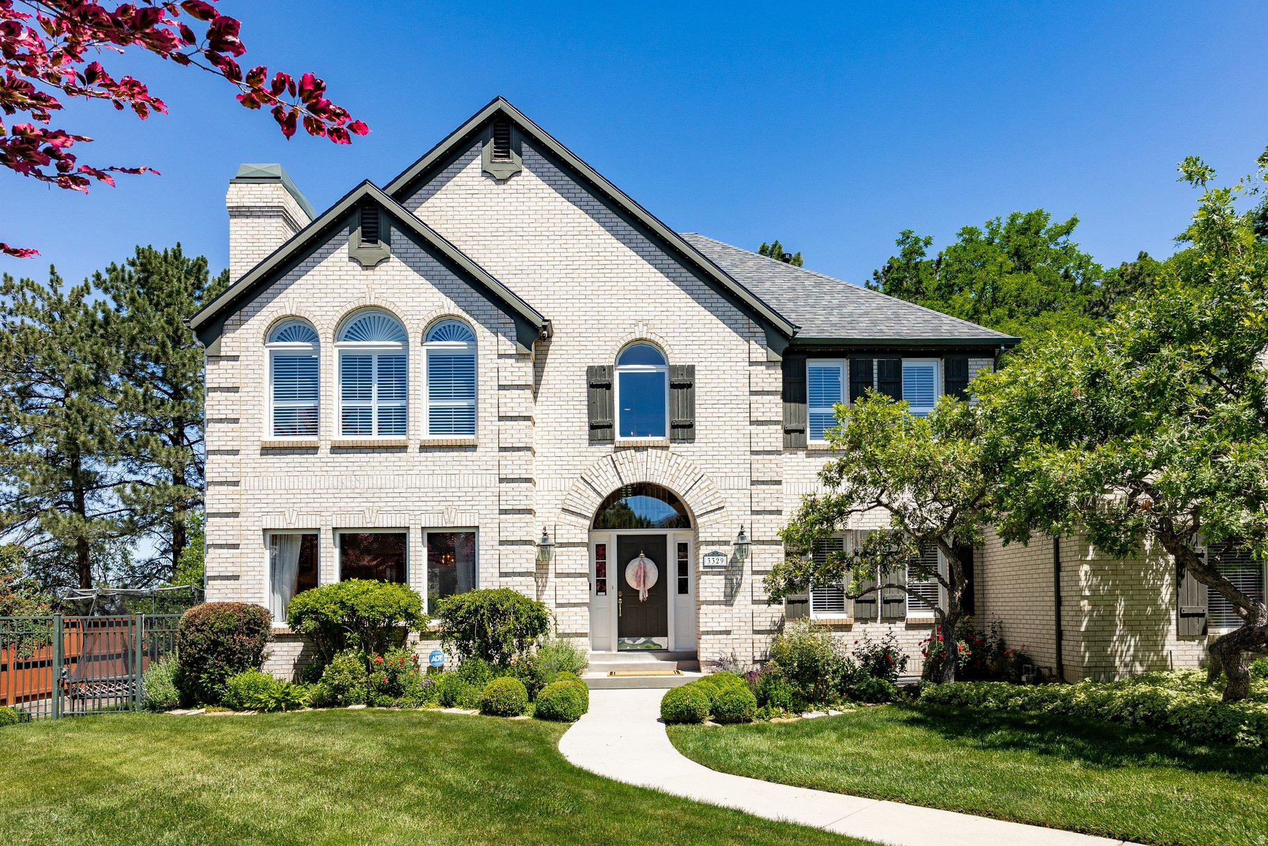 Tucked away on a peaceful, tree-lined lane in the heart of Cottonwood Heights, this exceptional property offers a rare combination of privacy, serenity, and access to some of Utah's most celebrated outdoor recreation. Framed by mature landscaping and nestled beneath the dramatic backdrop of the Wasatch Mountains, the setting provides a true sense of retreat while remaining close to every modern convenience. The secluded backyard serves as a private sanctuary, surrounded by lush greenery and designed for quiet mornings, outdoor entertaining, and relaxing evenings under the stars. The tranquil atmosphere and natural surroundings create an ideal extension of the home's living space, offering year-round enjoyment and exceptional privacy. Perfectly positioned for an active lifestyle, the property is just minutes from the renowned Big and Little Cottonwood Canyons, placing world-class skiing, snowboarding, hiking, mountain biking, climbing, and alpine recreation practically at your doorstep. Championship golf courses, scenic trail networks, parks, and countless opportunities for outdoor adventure are all within easy reach. Despite its peaceful setting, the home enjoys convenient access to premier shopping, dining, highly regarded schools, and major transportation corridors. Offering the best of both worlds, this is a rare opportunity to enjoy a coveted Cottonwood Heights location where mountain living, natural beauty, and everyday convenience come together in perfect harmony. All information herein is deemed reliable but is not guaranteed. Buyer is responsible to verify all listing information, including square feet/acreage, to buyer's own satisfaction.