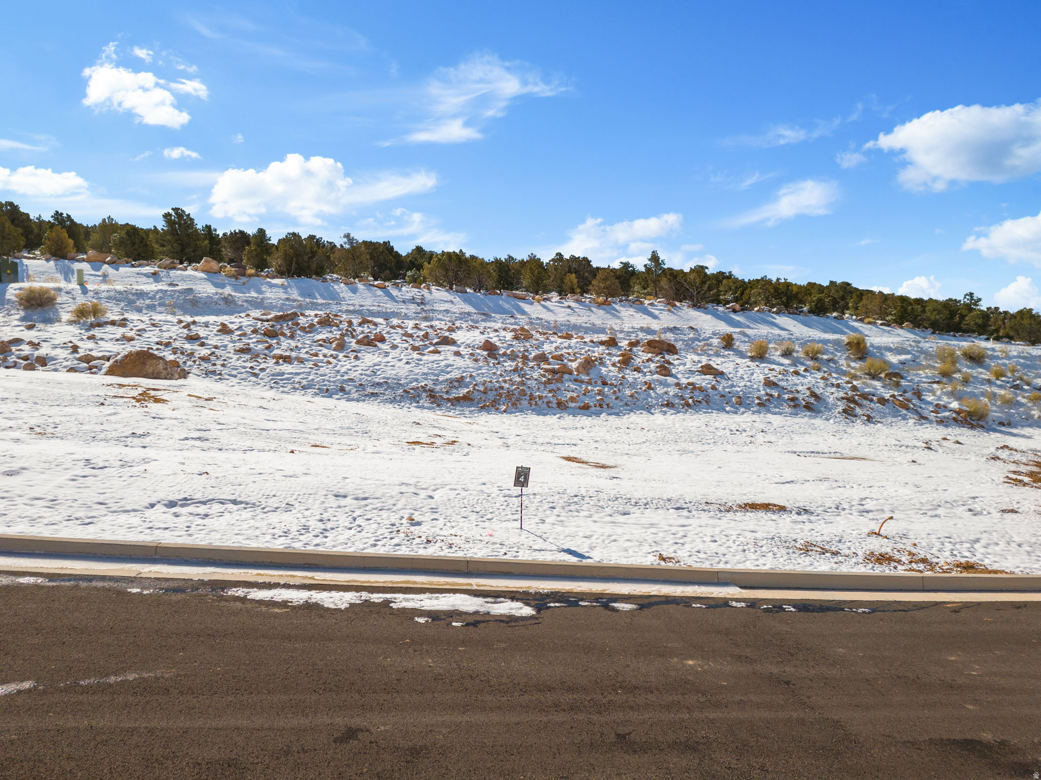 This is Lot Number 4, a .38-acre homesite located in the highly sought-after Estates at South Mountain subdivision. Enjoy stunning views of Shurtz Canyon and the surrounding Southern Utah mountains. This growing community is positioned near planned future elementary, middle, and high schools, adding long-term value and convenience. Bring your own builder or choose to build with the South Mountain Development team. Don't miss this opportunity to secure a premium lot in one of Cedar City's most desirable neighborhoods.