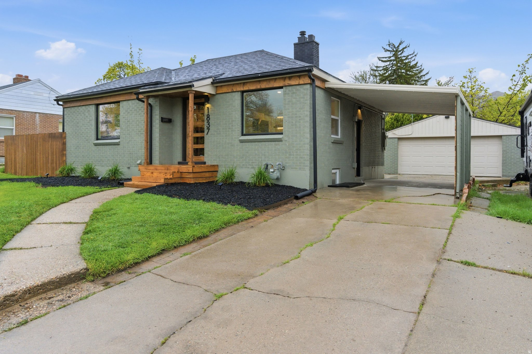 Buyers canceled, Back on market!  Stunningly Remodeled Mid-Century Modern Gem in the Heart of Sugarhouse. Located in Salt Lake City's highly coveted Sugarhouse neighborhood, this designer-led masterpiece offers 3 bedrooms and 2.5 bathrooms of sophisticated living. The open-concept layout is drenched in natural light and perfectly situated within walking distance of top-rated schools, vibrant dining, and the iconic Sugar House Park. Beyond the aesthetics, this home offers complete peace of mind with significant "behind-the-walls" investments, including a brand-new roof, all new windows, and fully updated plumbing, electrical, and HVAC systems. The showstopper is the expansive primary suite, featuring a rare spa-inspired bathroom with a separate soaking tub and glass shower. Complete with a dedicated laundry room, an oversized garage plus carport, and a private covered patio for year-round entertaining, this home delivers unmatched luxury and utility in Salt Lake's most sought-after zip code.