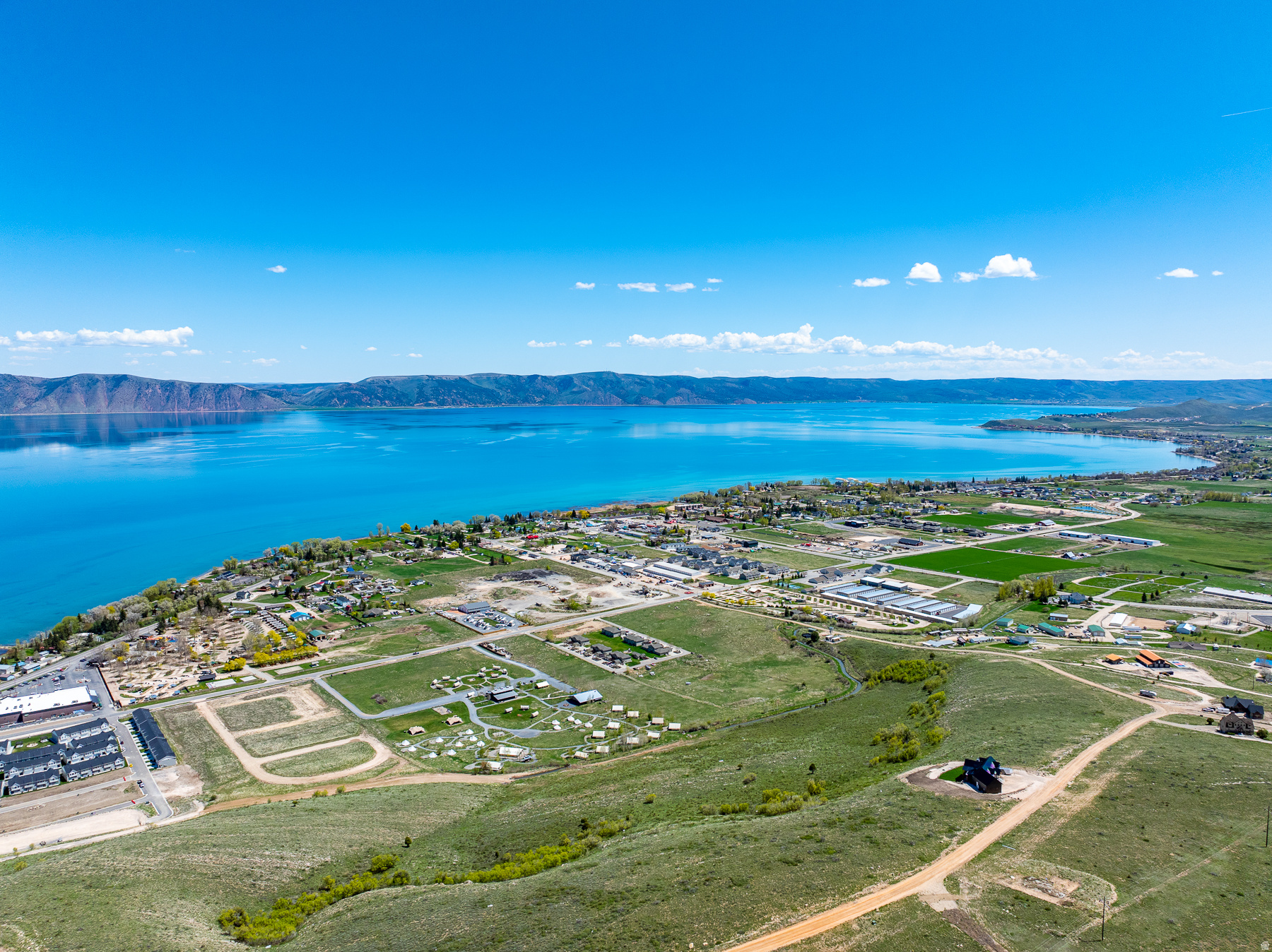 Fantastic building   lot! Unobstructed views of Bear lake and surrounding mountains. Dont miss an opportunity to own this fantastic  lot. Year round access, power, sewer water stubbed to the lot. Fantastic location for a short term rental or a dream home. Just minutes from state marina, local shops and restaurants, Beaver mountain and ATV and hiking  trails.