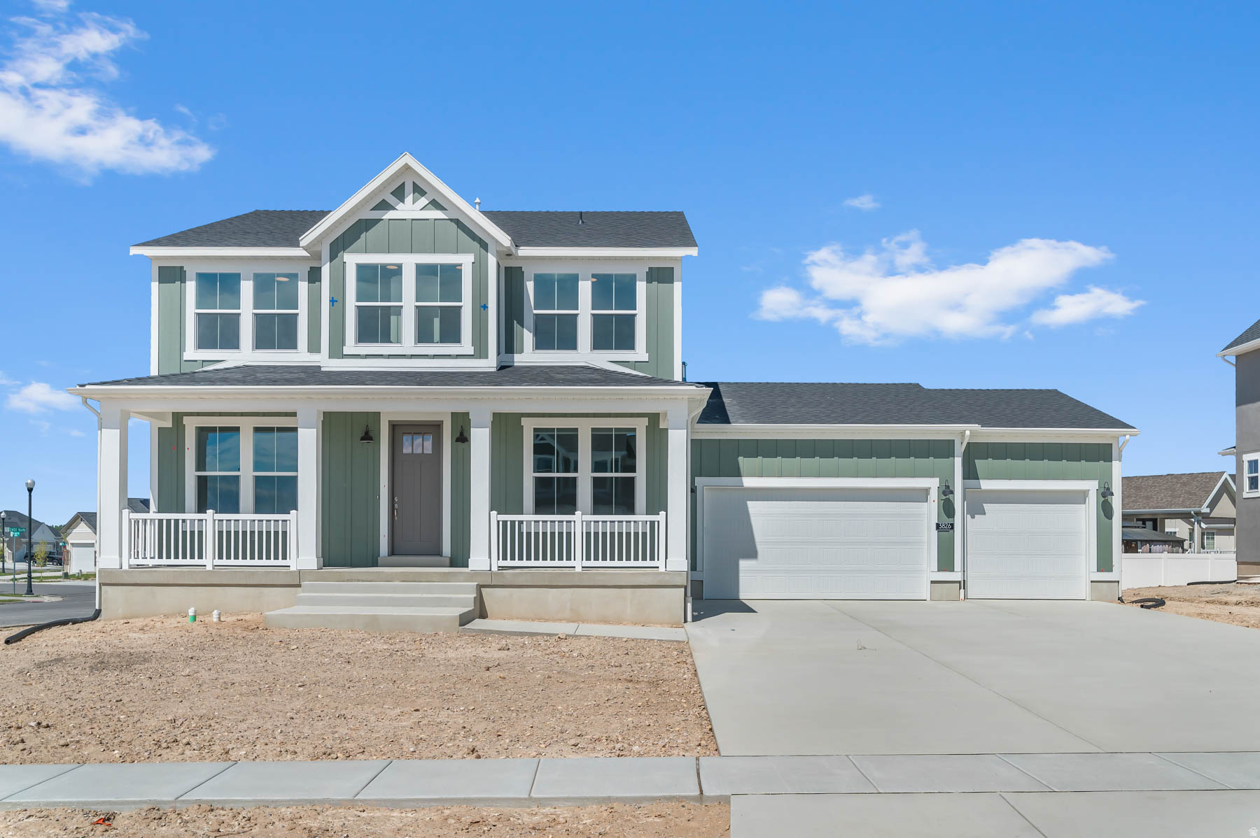 Brand new 2500 Farmhouse home plan in a great community just off the golf course!  This home features a modern kitchen with graphite maple cabinets, quartz countertops, tile backsplash and stainless steel gas appliances. Flooring includes laminate hardwood, tile, and carpet throughout. This home offers a 3-car garage with keypad and garage door and a box window in the kitchen nook. Additional highlights include can lighting, Christmas light outlets, a tankless water heater, half wall at the stairway, and a glass door to the office. Large Craftsman base and casing, 2-tone paint, and a grand owner's bathroom with quartz surrounds and Euro glass doors complete this beautifully designed home.