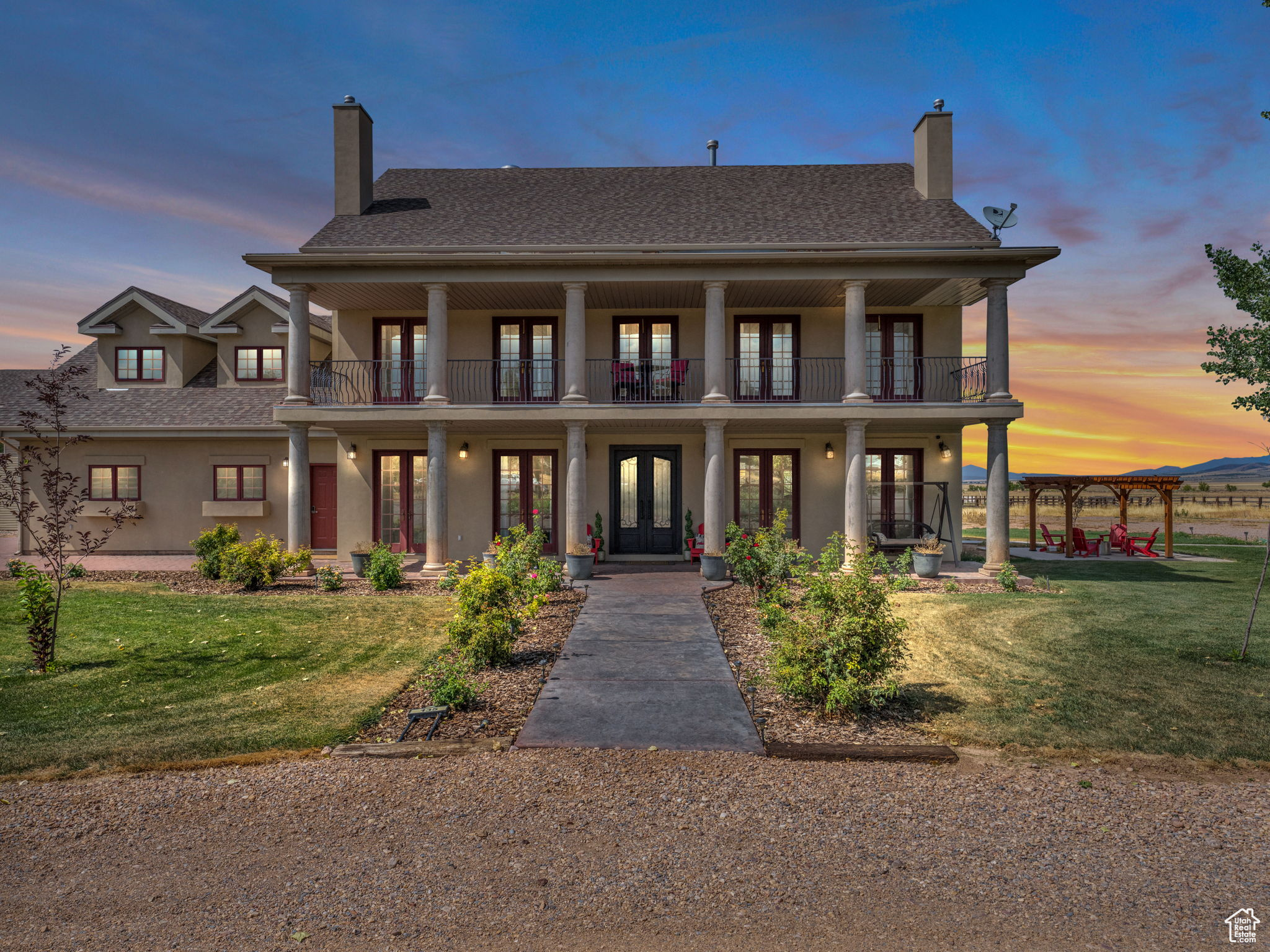 200k price adjustment! Elegant is an understatement. This fabulous 2-story home is an entertainer's dream and an ideal setup for a high-end Airbnb, corporate retreat, or unforgettable family reunion. Perfectly located in the heart of Utah, it's a convenient gathering spot for guests traveling from any direction. Each room is tastefully decorated and guest-ready, offering comfort, luxury, and style. French doors open from most of the rooms onto the veranda, allowing seamless indoor-outdoor living and breathtaking views. The gourmet kitchen features granite countertops, top-of-the-line appliances, and plenty of space for cooking and hosting. The master suite is a true retreat, offering an incredibly elegant bathroom and spacious walk-in closet. This home is being sold fully furnished with high-end luxury furniture, making it truly turnkey-just bring your suitcase or your guests.The lower level features its own private entrance and functions as a fully equipped Accessory Dwelling Unit (ADU)-currently operating as a successful Airbnb. Sitting on 1.75 acres, there's ample space to park ATVs, RVs, and accommodate guests. Three patios, covered porches, and expansive verandas create ideal spaces for entertaining or relaxing while enjoying incredible mountain views and sunsets. A detached multi-purpose building adds even more value-already heated and plumbed for two bathrooms, it's perfect for an indoor pickleball court, sport court, yoga studio, or event space to keep your guests entertained year-round. Whether you're looking to host, invest, or simply live in luxury-this one-of-a-kind property delivers on every level.