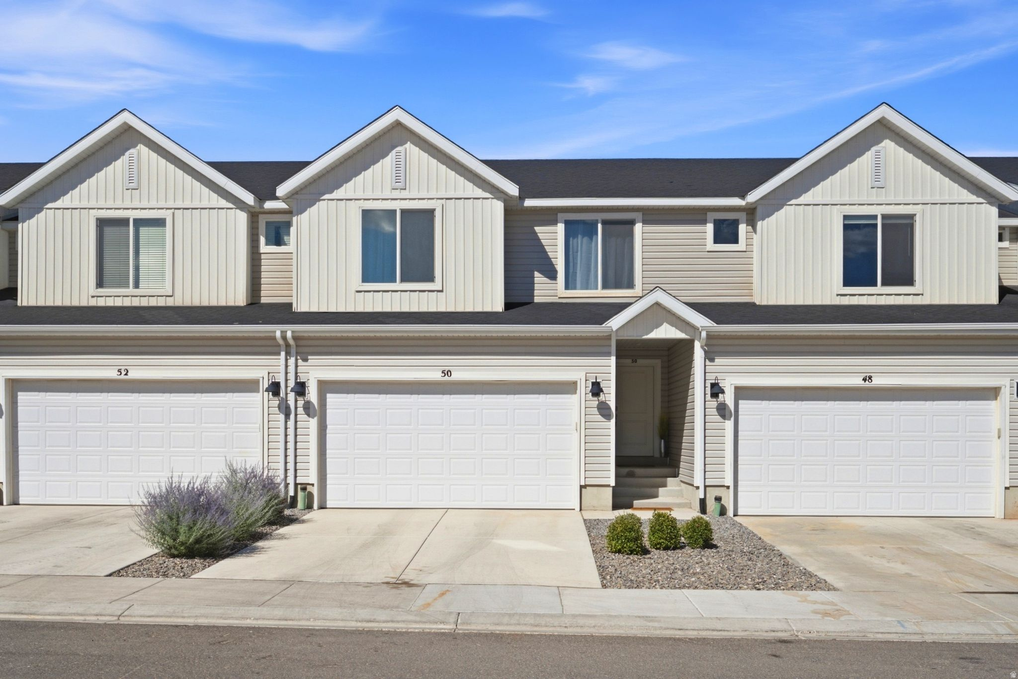 Showings start after the open house Saturday 11-2. Welcome to this beautifully maintained townhouse that feels more like a model home than everyday living. With over 2,400 square feet of thoughtfully designed space.Offeri ng 4 spacious bedrooms, 2 full bathrooms, and an unfinished basement ready for your personal touch, this home gives you the flexibility to grow as your needs change. Whether you dream of adding another family room, home gym, office, or extra bedrooms, the possibilities are endless. Step outside to your private back patio-the perfect place to enjoy your morning coffee, unwind after a long day, or entertain friends on warm summer evenings. If you've been searching for the peace and beauty of country living without sacrificing convenience, you've found it. Enjoy dark skies where the stars still shine bright, all while being just 20 minutes from the airport and only 30 minutes from downtown Salt Lake City. It's the perfect balance of quiet living and easy access to everything you need.