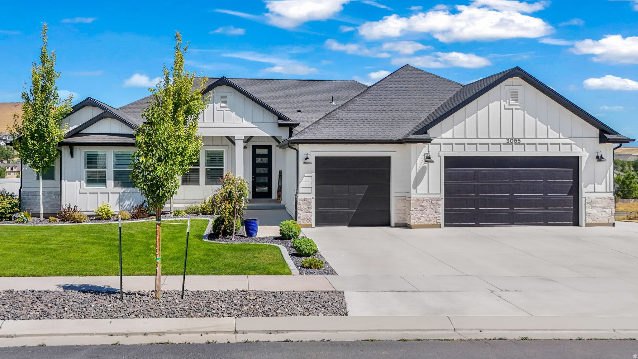 Come tour this incredible 8-bedroom rambler with 3-car garage and stunning views in Eagle Mountain! This beautifully designed home sits on a .5 acre lot and features a large primary suite complete with dual vanities, a relaxing soaker tub, separate shower, and a spacious walk-in closet . A bonus ensuite bedroom on the main floor is perfect for guests or multigenerational living. The layout of the main home includes 7 bedrooms, 4.5 bathrooms with two large family rooms, both with surround sound speaker systems, an office, a spacious kitchen with double ovens, a large island, and a beautiful butler's pantry.   The exterior of the home features a fenced back yard with fruit trees, in-ground tramp, a large partially covered deck, and 77-ft deep RV pad. There is also additional space behind the landscaped backyard to build a detached garage! In addition to the main home, the attached 900 sq ft 1 bed 1 bath ADU has a full kitchen, laundry and a separate entrance providing instant opportunity for rental income. With its perfect combination of stunning views, functional spaces, and rental space, this property is a true gem. Square footage figures are provided as a courtesy estimate only and were obtained from county records . Buyer is advised to obtain an independent measurement.
