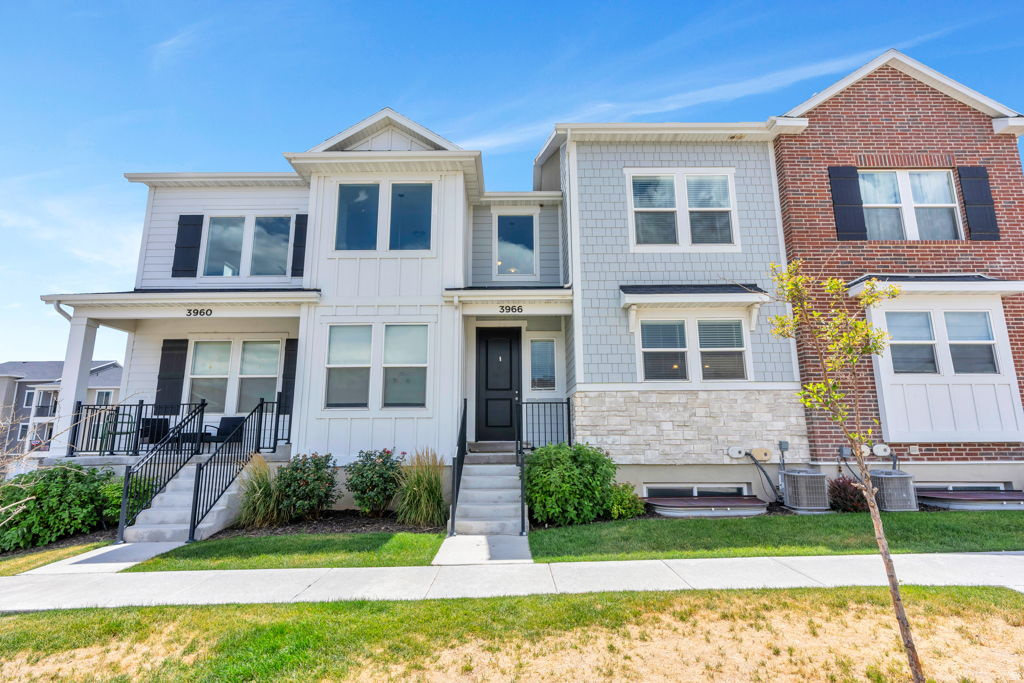Located directly across from the community pool, clubhouse, and playground, this townhome offers the best spot in the highly sought-after Exchange community. Enjoy unmatched convenience and resort-style living with access to two pools, pickleball courts, basketball courts, multiple playgrounds, pet-friendly areas, and two beautifully designed clubhouses. This home includes all essential appliances refrigerator, washer, and dryer! Upgraded quartz countertops, sleek white cabinetry, LVP wood-look flooring, and a tankless water heater so you'll never run out of hot water. Don't miss your chance to live in one of the most vibrant and amenity-rich communities around!  Square footage is an estimate - buyer to verify.