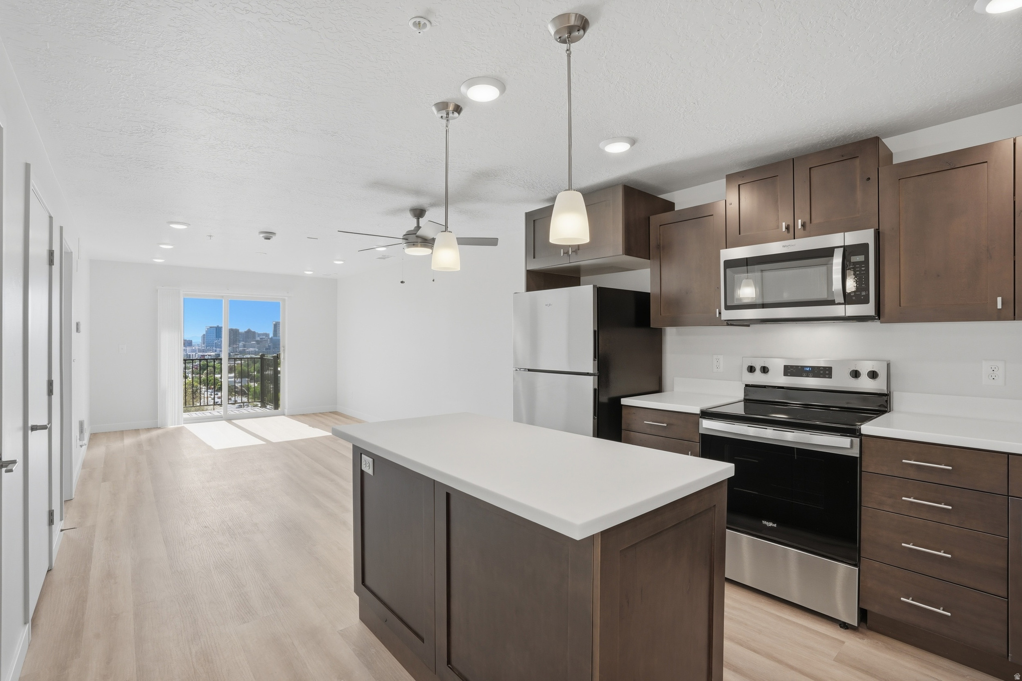 This exquisite top-floor, penthouse, brand-new construction condo has incredible views of the city. It features an open-concept living and kitchen area, a spacious bedroom with a walk-in closet, a full bathroom with tub and shower and ample vanity space, and a private balcony with stunning views. The building was rebuilt after a fire and includes new framing, drywall, and paint; seismic, structural, and foundational reinforcements; upgraded sewer and water infrastructure; new plumbing, electrical, and hvac; new roof; building-wide sound deadening; fire suppression and alarm system; upgraded fire separation in attic, walls, and floors; emergency backup generator; digital thermostats; trex patio decks; and more. Enjoy upgraded amenities such as a pool, hot tub, sauna, automated package pickup lockers, fitness center, grassy outdoor area, barbecue area, on-site laundry room, and more, all with low HOA fees! This is a controlled-access building with an onsite property manager, and the unit includes one covered parking space. It's one-level living at its finest! This prime location is near the University of Utah, public transportation, hiking and biking trails, restaurants, shopping, downtown, world-class skiing, and more. There is no rental cap or waiting line on long-term rentals. This is definitely one you don't want to miss! Additional storage may be available for a monthly fee. No pets. No smoking. Google Fiber. Square footage figures are provided as a courtesy estimate only and were obtained from county records. Buyer is advised to obtain an independent measurement. Seller is doing a 1031 exchange.