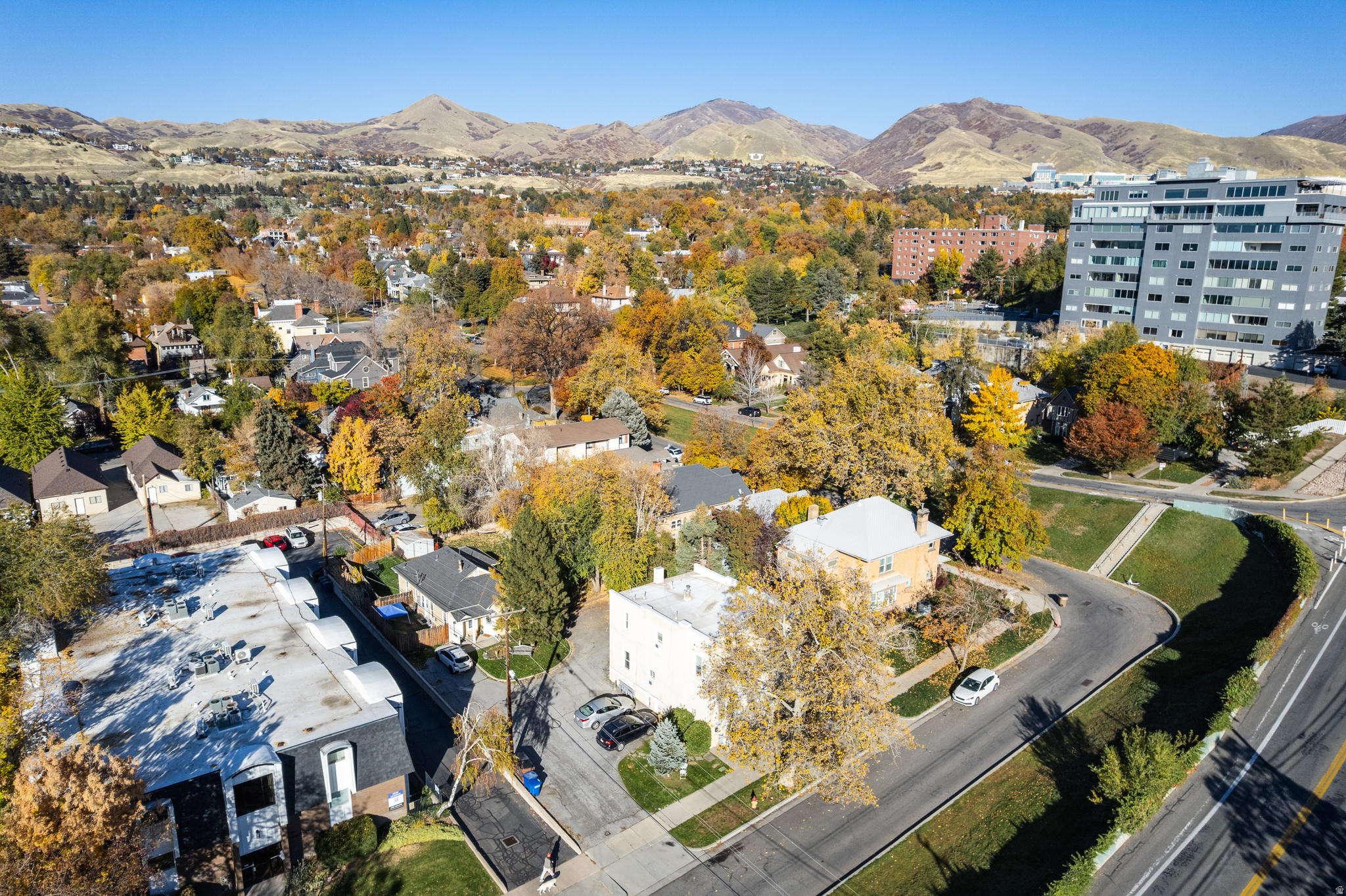 Situated in the heart of Salt Lake City's sought-after University neighborhood, 1169 East 200 South is a seven-unit property that artfully blends historic charm, modern updates, and solid investment potential. Just minutes from the University of Utah, this 5,212-square-foot multifamily asset offers enduring appeal, consistent tenant demand, and long-term stability in one of the city's most walkable and convenient locations. Originally constructed in 1924, the property is composed of two distinct buildings. The front building features five well-appointed one-bedroom units that pair classic architectural details with thoughtful modernizations. The rear duplex includes a studio and a two-bedroom, one-bath residence that opens to a spacious private yard, a rare amenity for multifamily housing in this area. With an extra large lot within walking distance to the University of Utah, the possibilities are ample!