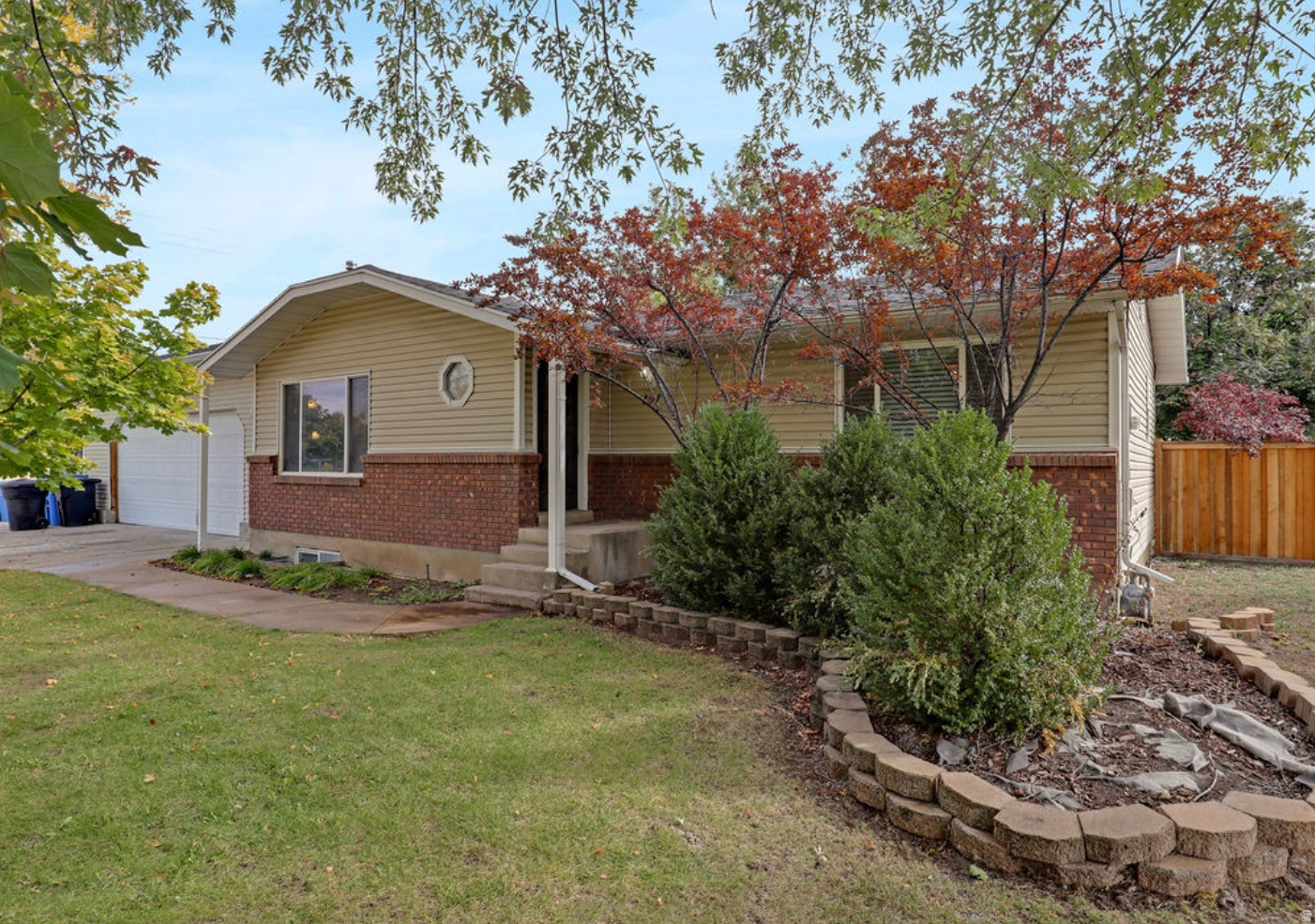 Tenants have moved out, now easy to show! Instant Equity! This 3-bedroom, 3-bathroom Main level Living Rambler home in Hyrum, Utah offers 2,026 sq ft of functional living space with a walkout basement and mother-in-law apartment potential.  Situated on over a quarter acre with mature trees and sweeping mountain views, the property delivers the space, privacy, and outdoor lifestyle that Cache Valley buyers are searching for. The oversized deep garage with extra ceiling height accommodates large vehicles, a workshop, or serious storage needs and dedicated RV and boat parking set this listing apart from comparable inventory at this price point. Location is a standout: just 5 minutes to Hyrum Reservoir for boating and paddleboarding, 10 minutes to Blacksmith Fork Canyon for hiking and fishing, and convenient access to Logan schools, shopping, and dining via US-89. Whether you're a first-time buyer building equity in Northern Utah, an investor targeting value-add residential in Cache Valley, or a growing family needing room to spread out, this home checks the boxes that matter. Properties with this footprint, lot size, and proximity to outdoor recreation rarely come available in the 84319 market at this price.  Priced to move. Built to last. Welcome to Cache Valley.  Square footage figures are provided as a courtesy estimate only.  Buyer is advised to obtain an independent measurement.
