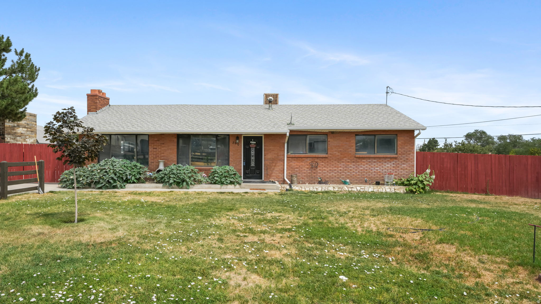 This cute home is all brick with large rooms that sits on .44 acres. The outdoor space includes stamped concrete, Has 24x14 covered patio, and a large firepit area that is a thing dreams are made of! The detached garage is 24x32 with a 14x18 work shop on back, has plenty of space for storage as well as your vehicles. Inside you will find a living room, family room, and large kitchen that would be great for entertaining. There are 2 bedrooms and 1 large bath upstairs and a bedroom/family room area in the basement. This room can be accessed from the back of home as well. The rest of the basement is a large laundry/utility room with lots of storage. Water rights # 15-2479 is included in this property with full price offer. Pressure tank is in garage. The seller uses well to water the yard. This property is also set up for Grantsville irrigation and the buyer could purchase irrigation shares if they wanted. Buyer is advised to get an independent measurement.