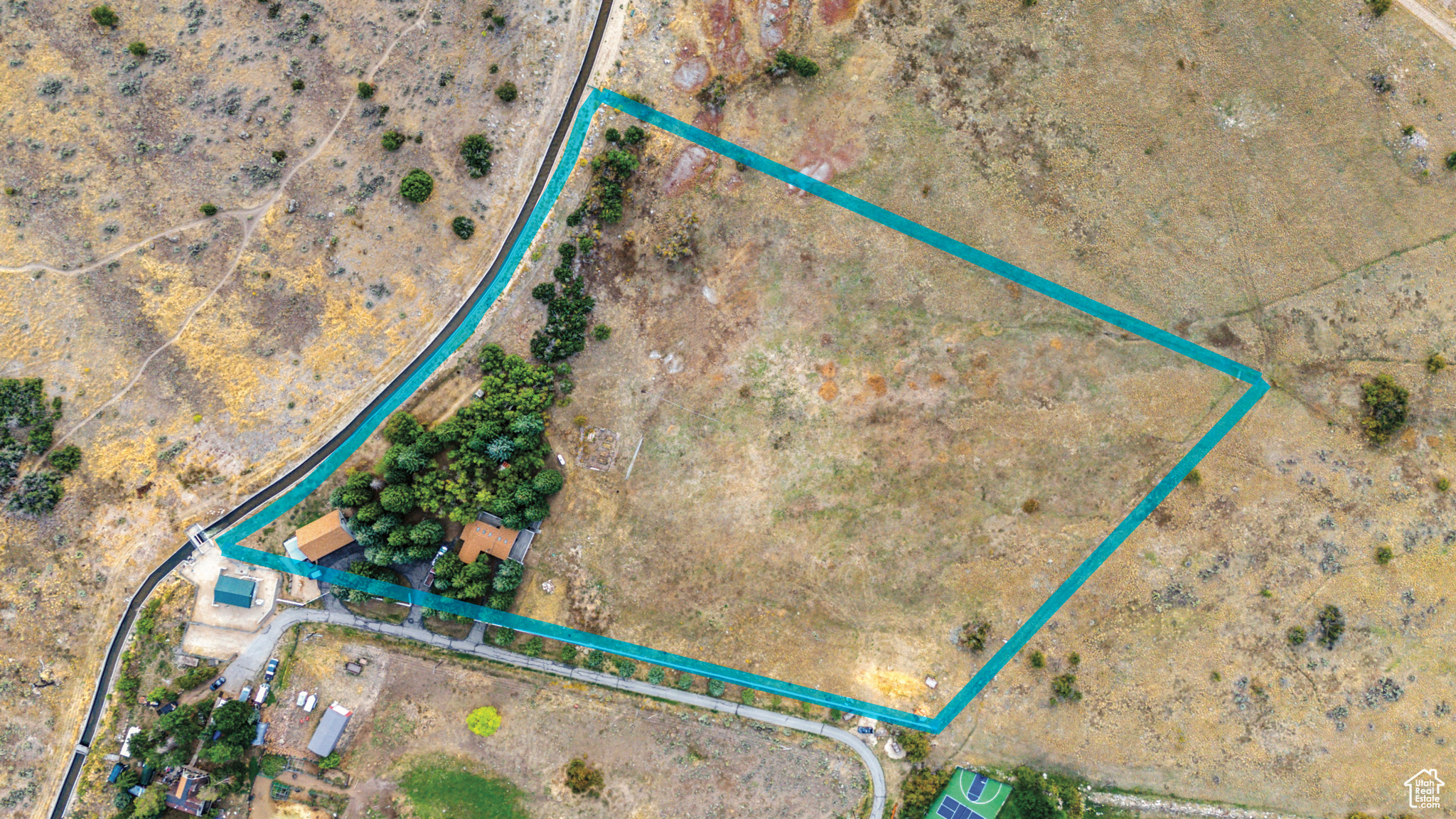 This exceptional 7.05 acre development, equestrian or estate parcel sits in the highly sought after North Village (NVOZ) of Heber City, with sweeping views of the Heber Valley and MT. Timpanogos. This property is zoned NOS, and has 24.5 Equivalent Residential Units (ERU's) allotted. A 1/3 ownership in a private well and 4 shares of Timpanogos Irrigation is included. There are three parcels that are included in the sale 00-0020-7961, 00-0007-7805 and 00-0007-7722.  Located 6 min from Deer Valley's East Village and 15 min to Park City. The Location can't be beat.   Acreage and Property information is obtained from county records. Seller makes no warranty to accuracy and Buyer is advised to verify all information to Buyer's satisfaction.