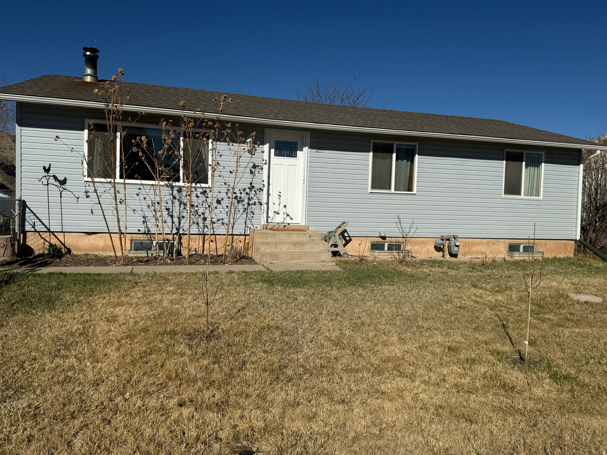 A great home in a great neighborhood!  All public utilities!  Fiber internet!  Gas forced air furnace PLUS a woodstove heat the whole place affordably! City water plus secondary irrigation water! Split system central A/C!  Laundry and pantry right inside the back door!  Fenced yards front and back and you can keep the chicken coop! The property Borders a field. And fishing the Duchesne River is close to home!  Finish the basement to your taste! We would love to show you!