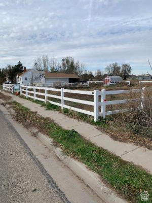 Value is in the 2.49 Acres of potential future Land/Residential /Commercial Development...City has given encouragement to Land/residential zoning development. But of course, the new owners will have to gain full approval from Layton city. Sellers would be happy to provide any information or progress made with the development as well. Call listing agent for more information.