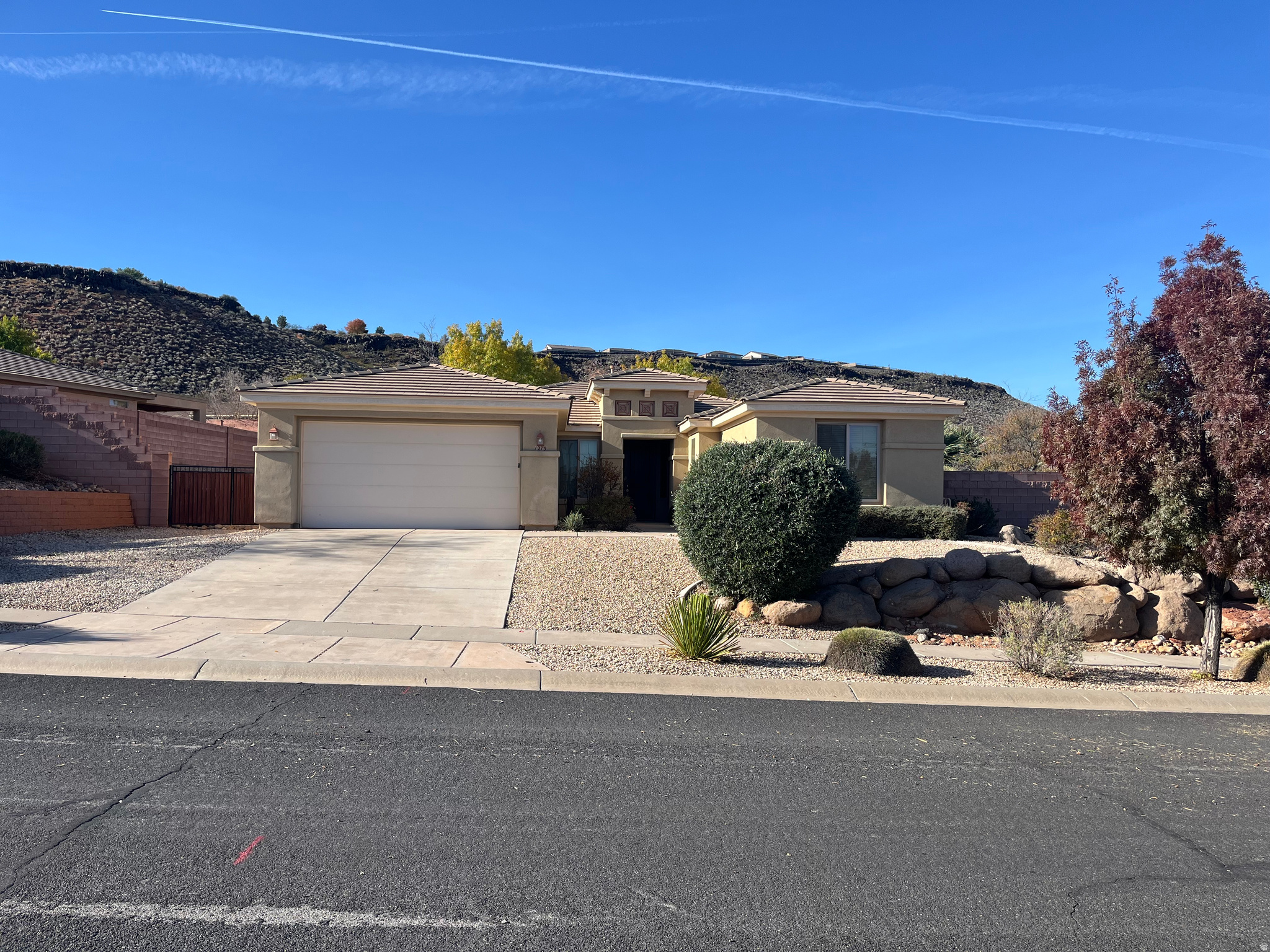 Located in the Coral Canyon golf-course community, this 2,343 sq ft home sits on a quiet cul-de-sac in an established neighborhood. Built in 2005, the property features a 0.34-acre lot with a large, flat, usable backyard and potential for a future pool. The home offers 3 bedrooms, 2.5 baths, flexible living spaces, and a 2-car garage. Fully landscaped. HOA restricts short-term rentals and includes indoor and outdoor pools, tennis and pickleball courts, fitness center, and playgrounds. Convenient access to Washington, St. George, Hurricane, and Zion National Park. Furnishings available separately and will be transferred under separate bill of sale.