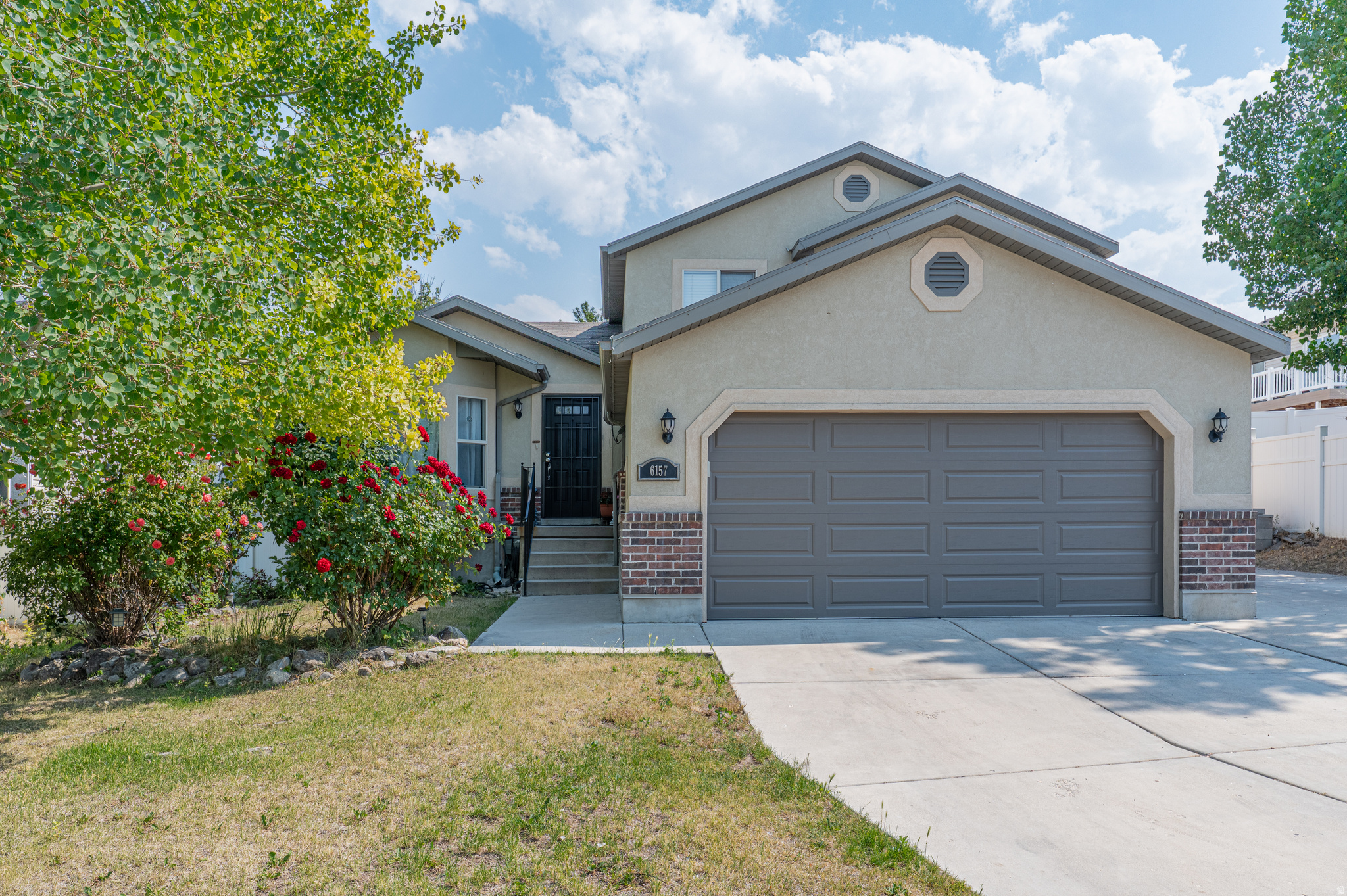 Welcome to this beautiful house. This home has 6 spacious bedrooms and 3.5 modern bathrooms, a spacious kitchen with quartz countertops, and a dining room. The tri-level design offers distinct living areas that provide both privacy and comfort. With a convenient two-car attached garage and additional RV parking, you'll have plenty of room for vehicles and recreational toys. The ample outdoor space is ideal for entertaining. Ideally situated in West Jordan, close to schools, parks, shopping, and major highways, this home offers the perfect blend of space.