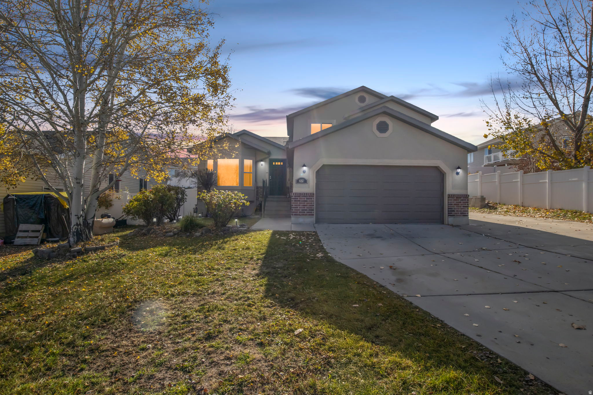 Welcome to this beautiful house. This home has 6 spacious bedrooms and 3.5 modern bathrooms, a spacious kitchen with quartz countertops, and a dining room. The tri-level design offers distinct living areas that provide both privacy and comfort. With a convenient two-car attached garage and additional RV parking, you'll have plenty of room for vehicles and recreational toys. The ample outdoor space is ideal for entertaining. Ideally situated in West Jordan, close to schools, parks, shopping, and major highways, this home offers the perfect blend of space.