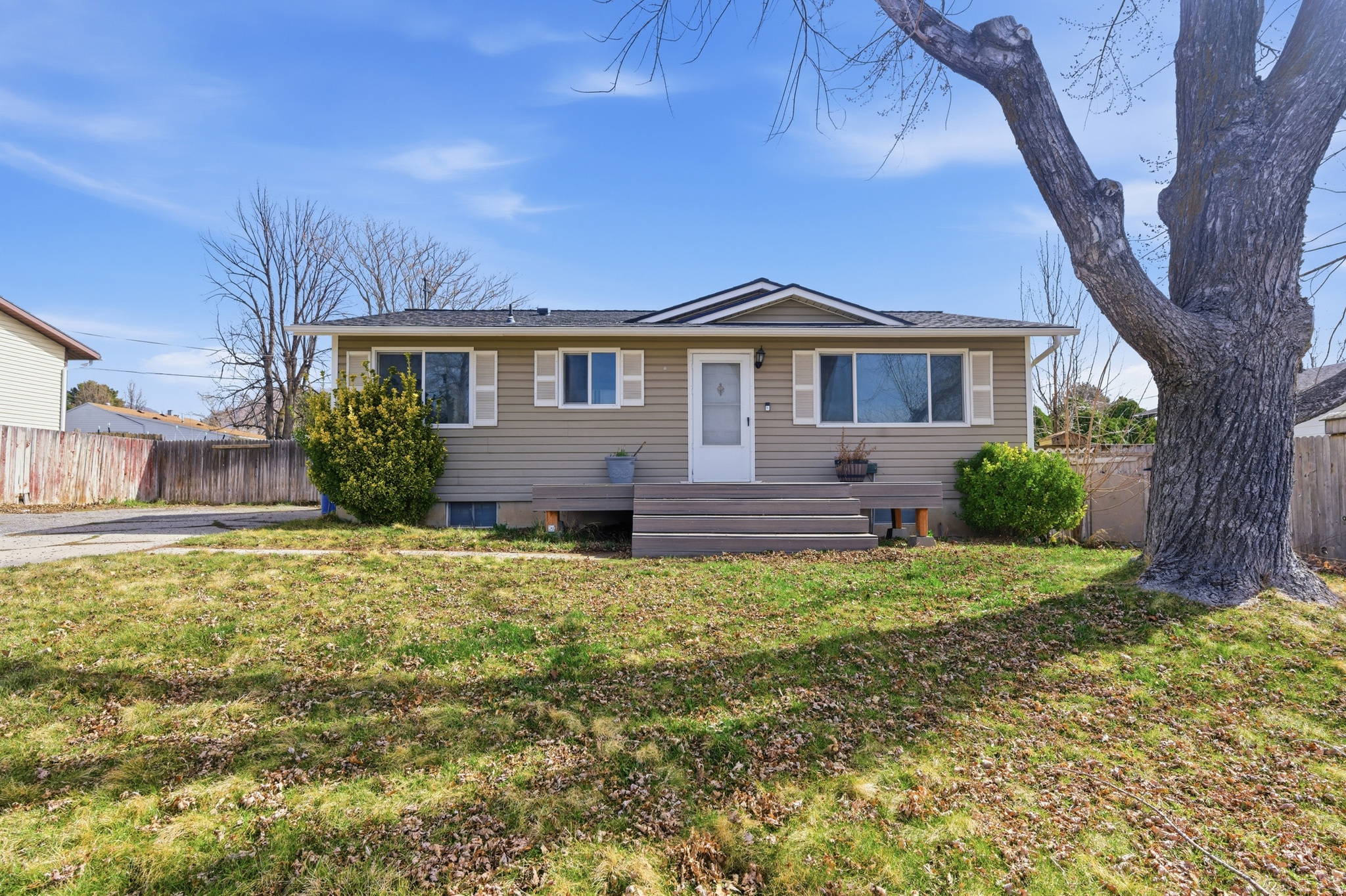 Price Improvement!! Charming 4-bedroom, 2-bath rambler in a great American Fork location just minutes from downtown. Enjoy comfortable single-level living with a functional layout and plenty of space. The large yard features beautiful mature trees, offering shade, privacy, and room to relax or entertain. Close to shops, dining, parks, and commuter routes. Don't forget about the paid off solar system to lower that power bill!!