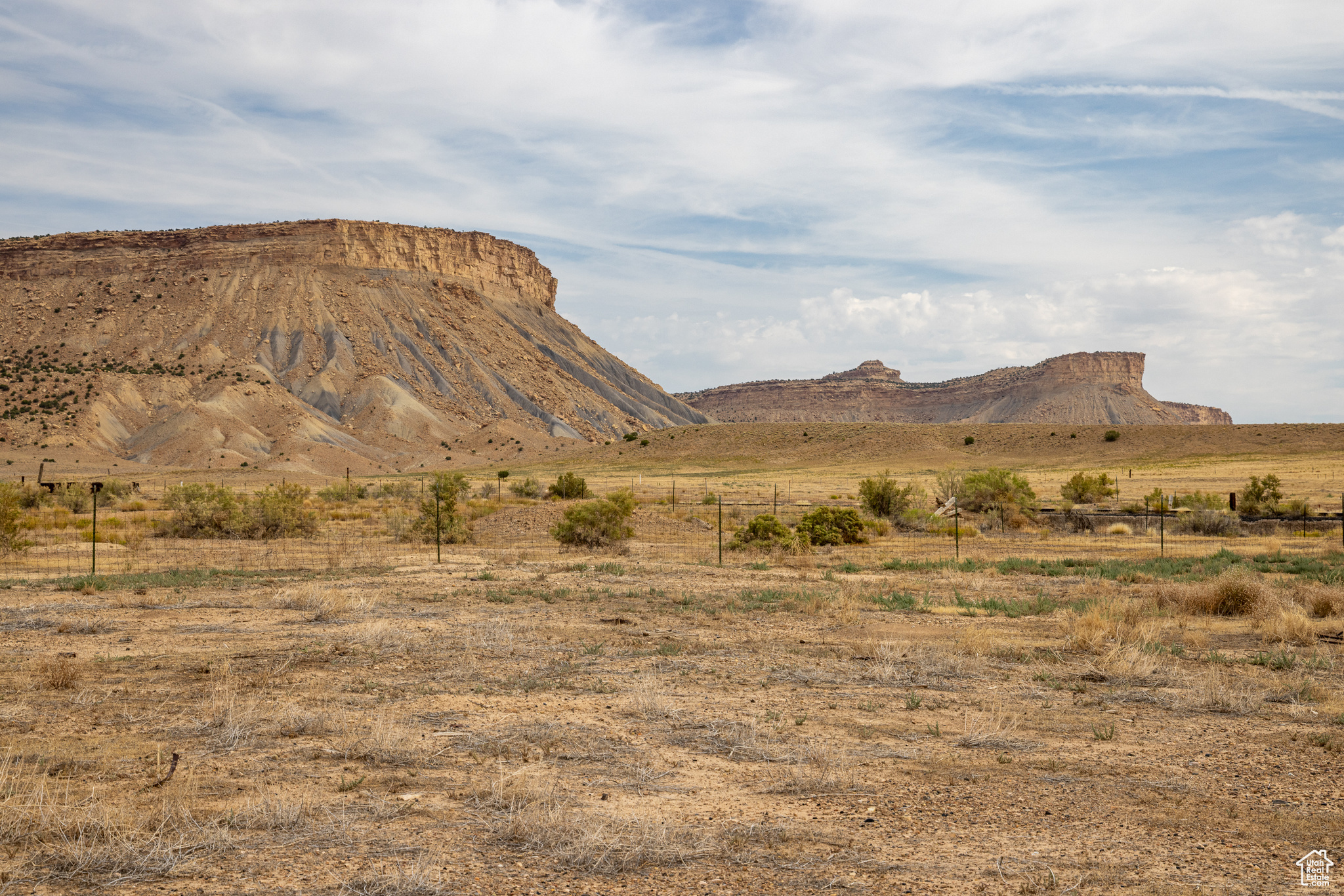 Bring Your Plans! The Water's Already Here. Wide-open space, big skies, and the hard part already done. This 2.22-acre Rural Residential parcel is framed by beautiful Book Cliffs views and classic red rock scenery. Best of all, water is already connected-a major win and a rare advantage in this area. Power is conveniently located about 800 feet away, putting you well on your way to turning possibilities into reality. Whether you're dreaming of a desert hideaway, a full-time home, or simply a place to hold and enjoy for years to come, this property offers room to breathe, space to create, and easy access to Moab and I-70. A special opportunity in Utah's wide-open country.