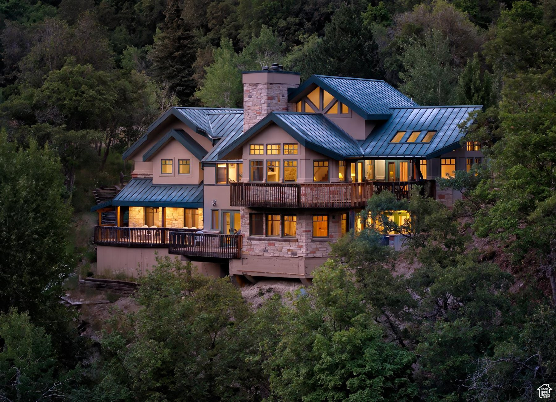 From world-class skiing in the winter to hiking and bike riding in the summer - experience all the year-round enjoyment that Sundance Utah, has to offer. The views that this lodge-style home has to offer are out of this world, and look out to the resort of Sundance and the magical backside of Mount Timpanogos. The warm and Inviting home offers the comfort of four-plus bedrooms, four baths, two kitchens, a two-car garage and a separate studio apartment. There are multiple decks, one of which offers a hot tub with a view. The property is gated and secure.
