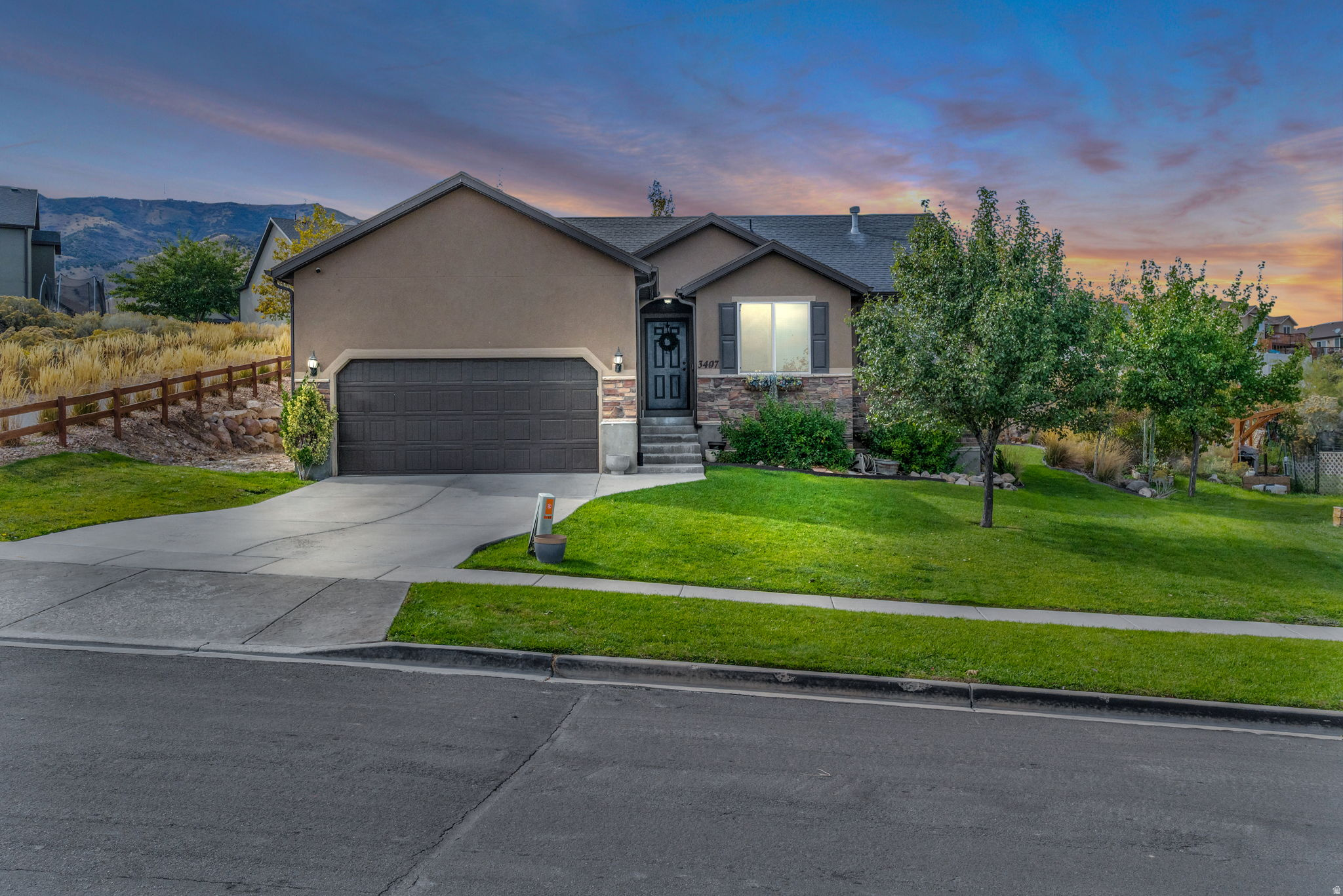 Back on market due to buyers circumstances changing! Preferred lender is offering a 1/1 buy down to help you get the best interest rate possible! Use it toward closing costs or an interest rate buy-down to get the perfect payment. Welcome to your beautiful 4-bedroom rambler, perfectly situated to capture stunning lake and mountain views. This home has been lovingly maintained and is ready for its next owner to call it home. Enjoy peaceful evenings in the spacious backyard, enhanced by elegant LED lighting-ideal for outdoor dining or entertaining under the stars. Inside, the open and inviting floor plan provides comfort and functionality, while the large basement offers plenty of space for gatherings, recreation, or future customization.   Square footage figures are provided as a courtesy estimate only and were obtained from county records. Buyer to verify all.