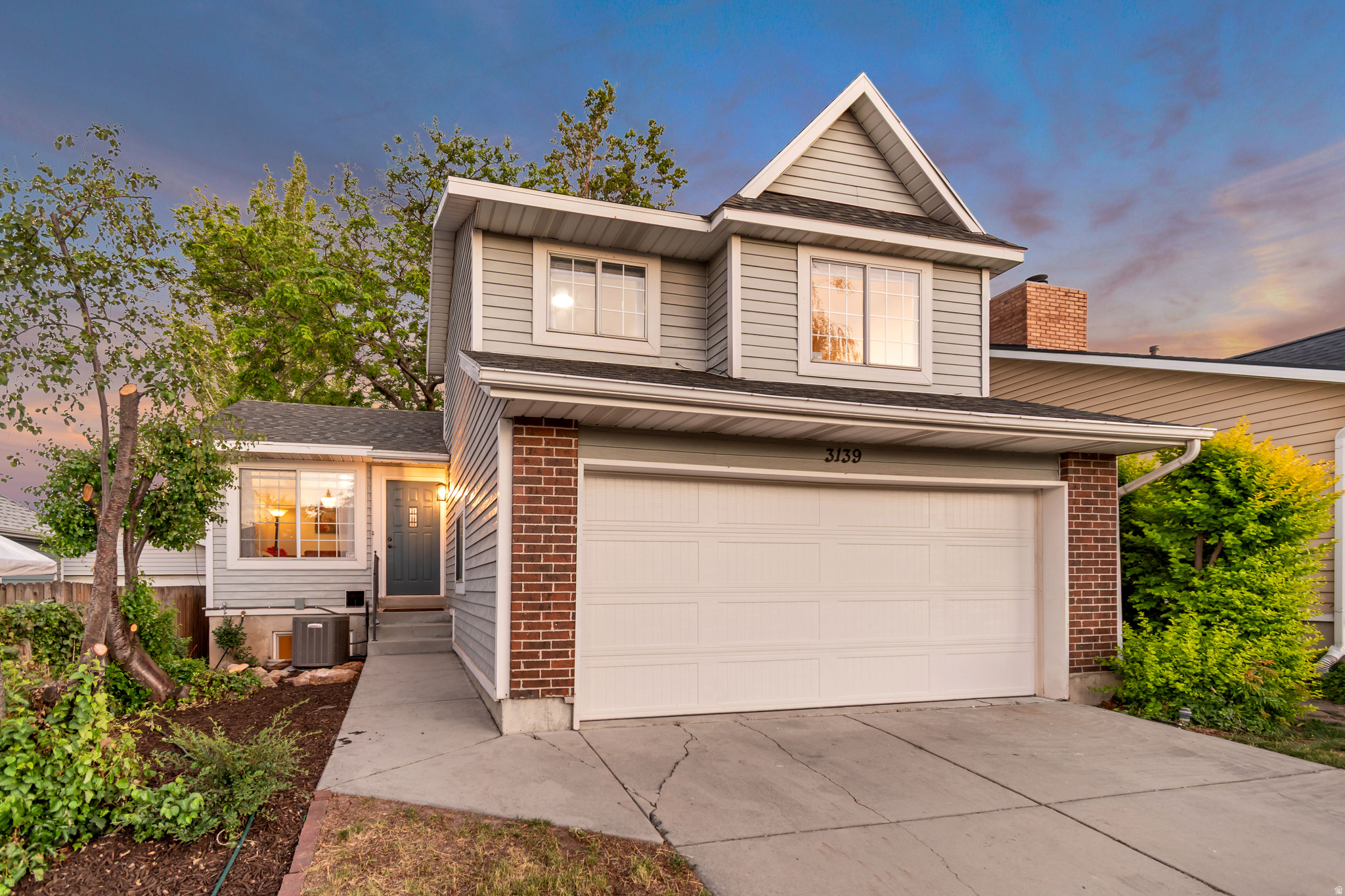 **Open House Sat. 6/20, 12-2PM** Feel at home from the moment you arrive at this beautiful and tastefully updated home. Convenient and coveted private neighborhood with no through traffic. Vaulted ceilings to wow you and windows abounding for natural light everywhere. Updated kitchen with granite counters. Refrigerator included. Beautifully updated subway tile bath with shower window.  3 bedrooms together on the upper level. Laundry room is upstairs too for your convenience! The basement is finished and is plumbed for an additional bathroom.   2018 Roof and AC. Hard to find in this neighborhood 2 car garage. Lots of shade in the back yard from the select mature trees. Second private patio wired and ready for a hot tub. Full and updated fencing. The neighborhood has a community park with playground and a pavilion within walking distance. Come and experience this beautiful home today!