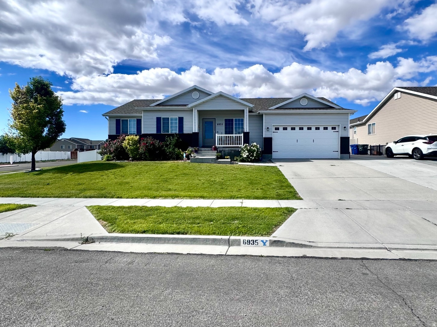 Welcome home to this beautifully finished 5-bedroom, 4-bathroom home in West Valley that truly checks every box! With major upgrades already completed-including a new HVAC system, water heater, water softener, and dishwasher within the last year-you can move in with confidence and enjoy true peace of mind. Inside, you'll love the updated finishes throughout, spacious living areas, and an incredible theater room perfect for movie nights, game days, or entertaining. Thoughtful details like dimmable recessed lighting on two-way switches create the perfect ambiance throughout the home. Step outside to a backyard built for fun and functionality! Enjoy your own putting green with sand trap, trampoline, swing set, and a massive RV pad with wide vinyl gates for easy pull-through access. Need extra storage or workspace? The detached shop is ideal for hobbies, projects, or additional storage, while both the shop and garage feature built-in shelving to keep everything organized. Plus, the shed has power!  Homes with this many updates, features, and outdoor amenities don't come along often. Two master bedrooms. One up and one in the basement! Don't miss your chance to make this incredible home yours-schedule your showing today before it's gone!  Square footage figures are provided as a courtesy estimate only and were obtained from the county. Buyer is advised to obtain an independent measurement.