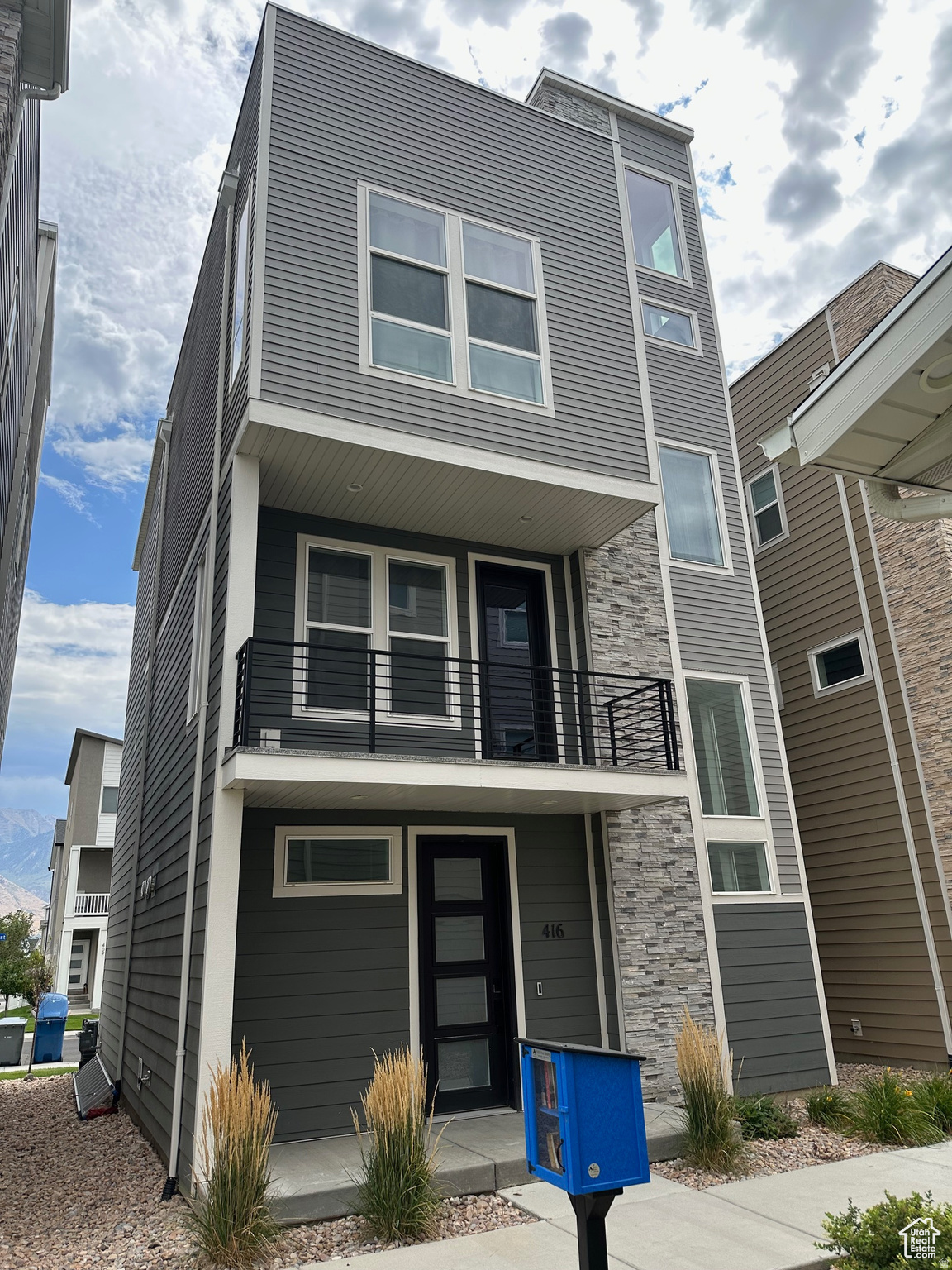 Built in 2022 and located in the highly sought-after Alpine School District, this stunning American Fork townhome blends luxury, functionality, and modern design in an unbeatable location near shopping, dining, parks, and quick freeway access. Situated at 416 S 650 E, this home offers convenient access to everything Utah County has to offer while still maintaining a quiet residential feel. Featuring 2 spacious primary suites, each with its own private ensuite bathroom, plus an additional half bath for guests, the layout is ideal for comfort and flexibility. The gourmet kitchen is beautifully designed for both entertaining and everyday living, while the wired whole-home Bose speaker system adds a premium touch throughout. Enjoy incredible mountain views to the east and unwind in the private west-facing courtyard or on the rooftop terrace - perfect for relaxing, hosting, or taking in Utah's sunsets. With approximately 1,860 square feet of thoughtfully designed living space, this home stands out with upscale finishes and unique features rarely found in townhome living. Most furniture is negotiable with the sale, offering a potential turnkey opportunity. Living room couch excluded.