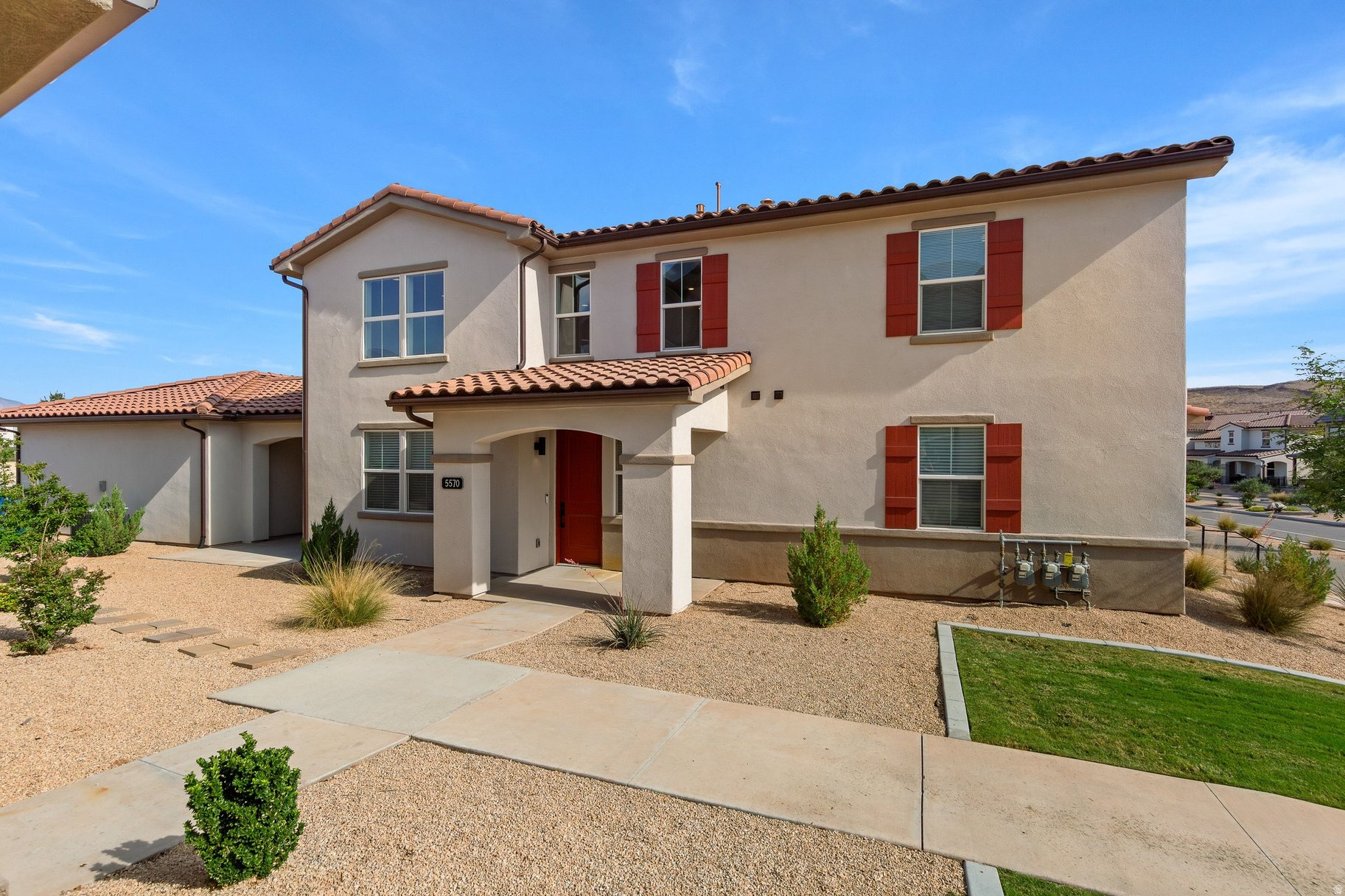 Nestled amidst the captivating Southern Utah Red Rocks and adjacent to the Arizona Strip, discover the sought-after Desert Color Community. This immaculate townhome, recently constructed, resides within Southern Utah's premier master-planned neighborhood. Picture yourself relishing the convenience of shopping, dining, and entertainment just a short stroll or drive away, while being encompassed by awe-inspiring national parks. Boasting 1,671 square feet, 3 bedrooms, 2.5 bathrooms, lofty ceilings, and a modern open floor plan, this townhome exemplifies contemporary living. Revel in the elegance of quartz countertops, exquisite cabinetry, and numerous other fine details. The Desert Color community offers a remarkable 2.4-acre zero-depth lagoon, ideal for paddle-boarding and leisurely enjoyment. Delight in the community center pool, along with nearby amenities like Crush golf and grill and upcoming dining establishments. Emphasizing an excellent school system and abundant potential for growth, this community is truly exceptional. The HOA covers internet, clubhouse access, and pool usage. . Please note that this home is not nightly or vacation rental zoned. Not only is this property minutes away from a wide array of amenities, but it is also a short drive to some of America's most breathtaking destinations, including Zion National Park, Bryce National Park, and the north rim of the Grand Canyon. Nearby state parks and national forests, such as Snow Canyon, Sand Hollow Reservoir, Gunlock Reservoir, Quail Creek Reservoir, and Dixie Forest, enhance the allure of the location. Situated at an elevation of 2,700 feet above sea level, at the crossroads of the Mojave Desert, Colorado Plateau, and the Great Basin, Southern Utah stands out as one of America's most captivating and geologically distinctive regions. This remarkable townhome epitomizes the essence of arriving in this extraordinary setting.  All information provided is reliable but not guaranteed. The buyer is responsible for verifying all listing details, including square footage and acreage, to their own satisfaction.