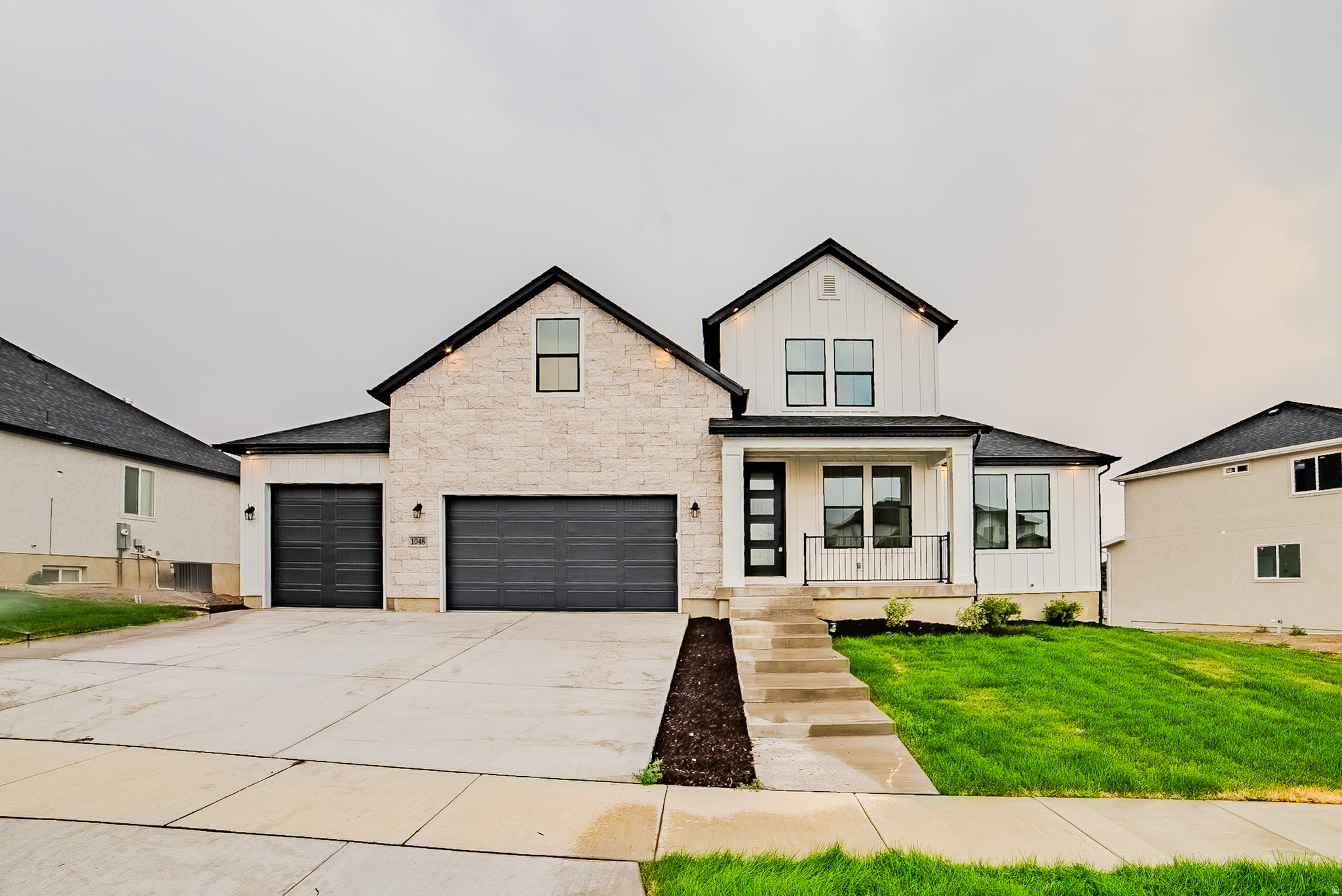 Home features a fully finished walkout basement with a 2-bedroom ADU and separate entrance, offering excellent multigenerational living or rental income potential. Gourmet kitchen includes custom cabinetry, quartz countertops, double wall ovens, vented hood, and gas cooktop. Main-level primary suite with spa-inspired bath and oversized walk-in shower. Buyer to verify all information, including square footage, taxes, and HOA details.