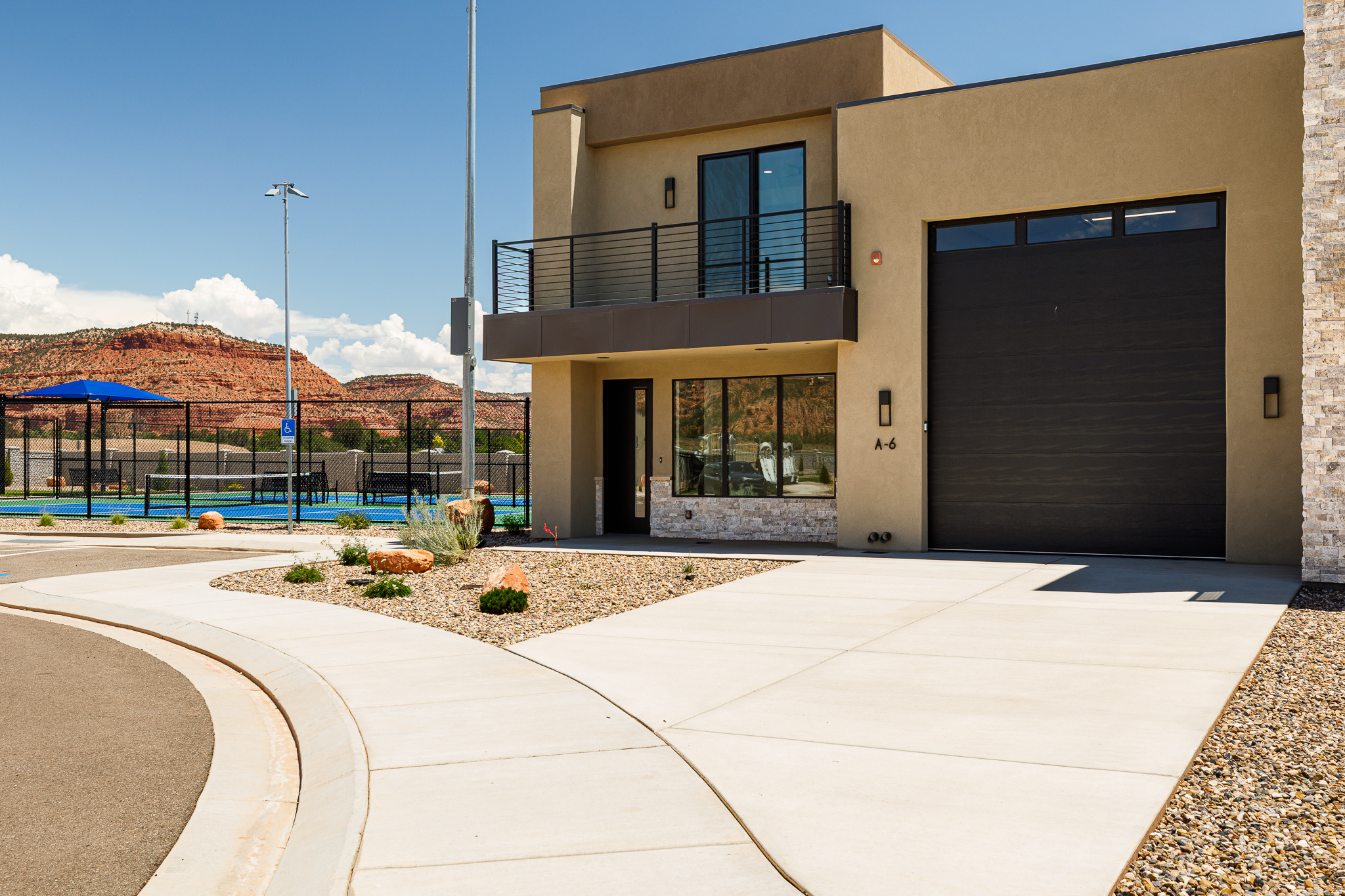 Discover luxury living at The Kivas at Catori Canyon. This beautifully designed 3-bedroom, 3-bath townhome features an open-concept floor plan, premium finishes, and an oversized RV garage complete with full RV hookups, including water, electric service, and a dedicated RV dump station.Community amenities include two swimming pools, a hot tub spa, pickleball courts, and a children's play area. Short-term rentals are allowed, making The Kivas an ideal primary residence, vacation home, or investment property.Property taxes are currently assessed at the second home/investment rate. Buyers who occupy the property as their primary residence may qualify for a lower property tax rate. Buyers should verify eligibility with Kane County. Buyer to verify all.
