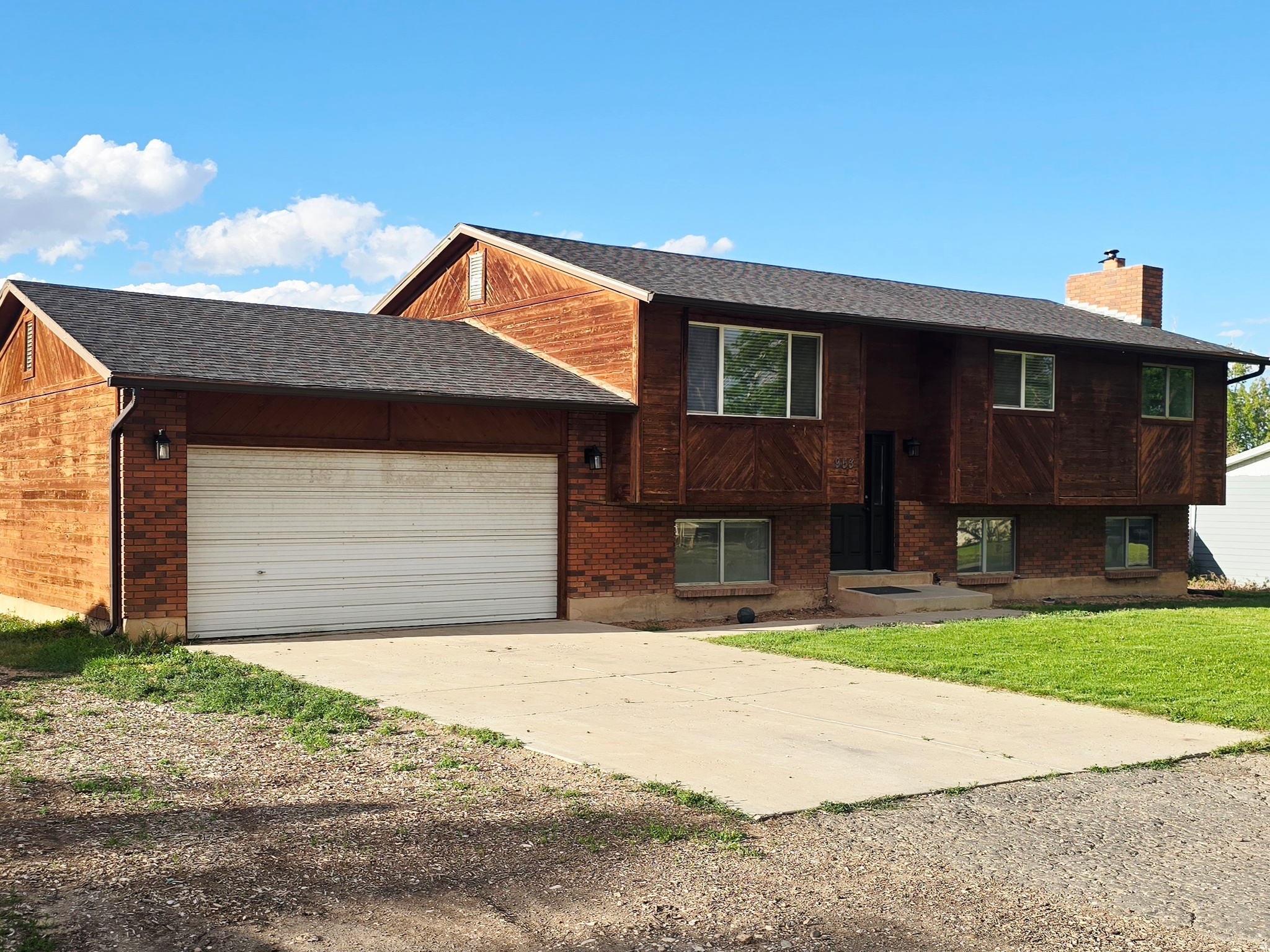 This 5 bed 2 bath home has new carpet upstairs, updated kitchen, Wood burning stove and gas stove insert, 2 living rooms, great new shop, huge lot,  fenced back yard!