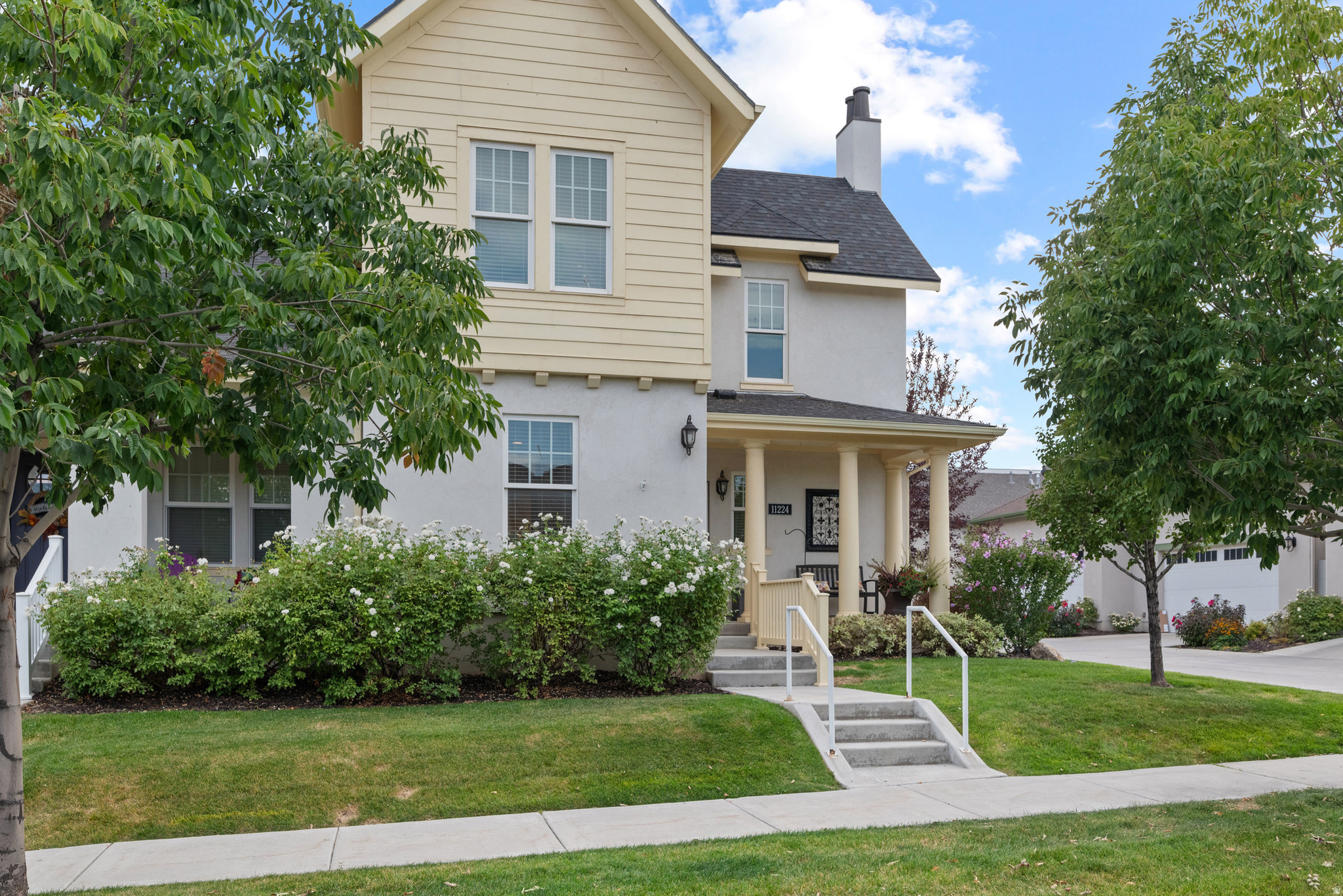 Beautifully maintained home in the highly desirable Garden Park Village community in South Jordan offering true low-maintenance Daybreak living with easy walking access to restaurants, entertainment, trails, parks, clubhouse, pools, fitness center, and community events. Conveniently located near SoDa Row, Oquirrh Lake, The District shopping center, UofU Health facilities, Mountain View Corridor, and Bangerter Highway. Inside, the home features a bright open layout with tall ceilings, abundant natural light, spacious living areas, and beautiful faux wood flooring. The kitchen offers granite countertops, custom beadboard island, tile backsplash, under-cabinet lighting, gas line, and plenty of cabinet space, making it both functional and inviting. The spacious main-level primary suite includes a walk-in closet and private bathroom with double sinks, while the roomy secondary bedrooms and upstairs bonus room provide flexible space for guests, hobbies, or working from home. One of the standout features is the private enclosed terrace and courtyard with mature landscaping, perfect for relaxing, entertaining, or enjoying peaceful mornings outdoors. Additional upgrades include newer carpet, radon mitigation system, custom laundry room cabinetry, and attached extra-length 2-car garage with storage.