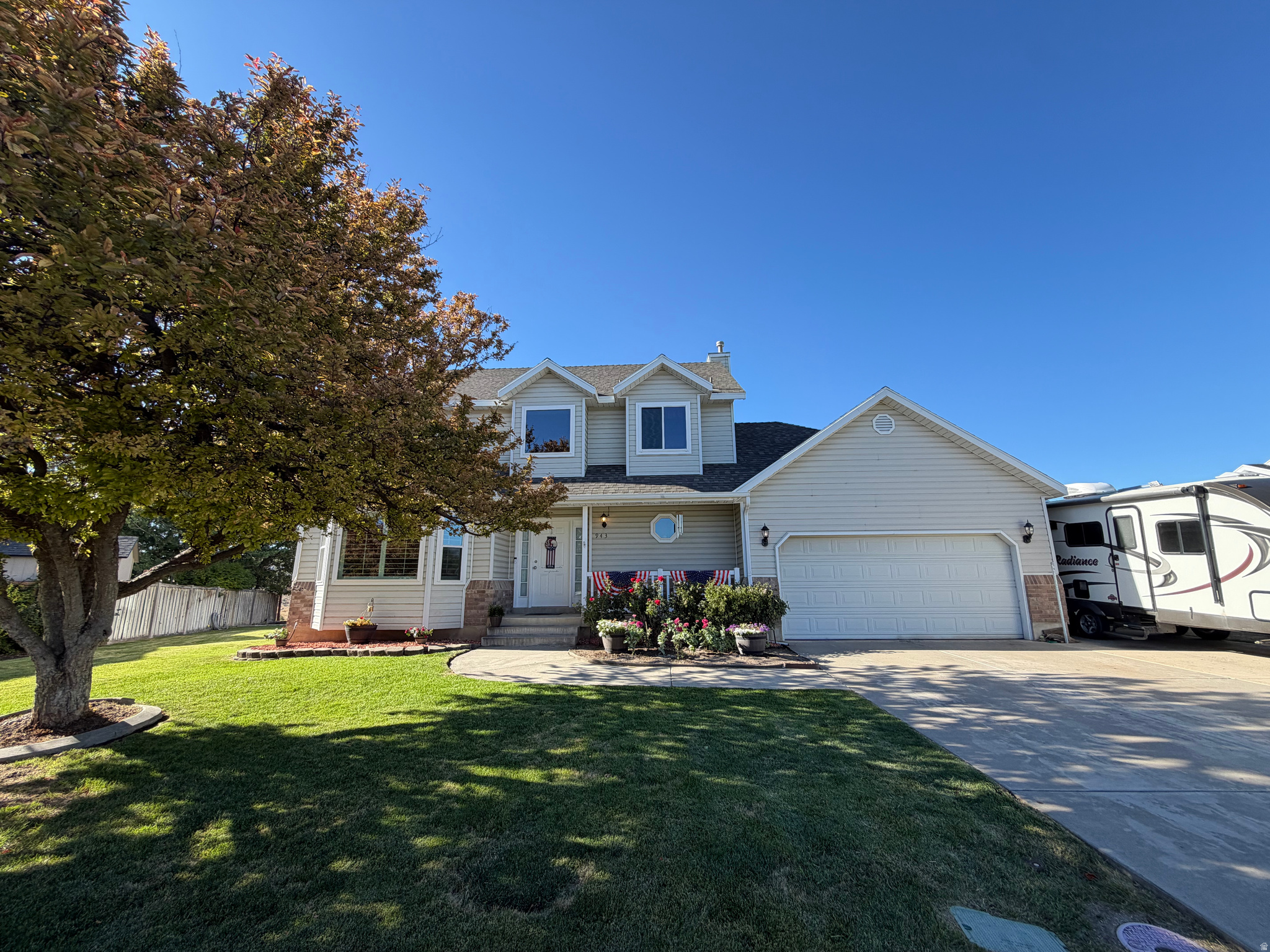 ***OPEN HOUSE: Thursday, July 9, 3:30 PM6:00 PM & Friday, July 17, 5:30 PM8:00 PM*** Location, Location, LOCATION  Welcome to this pristine 3-bedroom, 3-bathroom home in one of Lehi's most desirable, friendly neighborhoods. This beautifully maintained home features numerous updates, including a remodeled kitchen, updated bathrooms, new flooring in select areas, a new air conditioner, new furnace, and a newer roof with a 40-year warranty.     You'll love the plantation shutters, cozy fireplace, and the oversized 2-car garage deep enough room for a full-size truck plus an ATV on one side. Outside, you'll find an RV pad, storage shed, meticulously manicured yard, and beautiful mountain views that create a peaceful outdoor retreat. The permanent Govee exterior lighting is included, making holiday decorating effortless year-round.  Attractively priced and move-in ready, this home is truly a rare find. Join us at the Open House or schedule your private showing today-you won't want to miss it!
