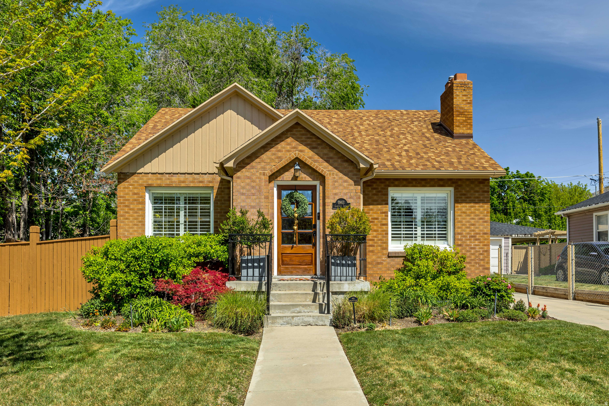 Price reduction! Easy to show. Nestled within one of Salt Lake's most beloved neighborhoods, this stunning bungalow blends timeless charm with thoughtful updates. The home has been meticulously maintained, reflecting pride of ownership with exceptional care throughout both the interior and exterior. The homes curb appeal welcomes with a tutor enclave entrance, setting the stage for what's inside! The kitchen boasts of high-end finishes including custom cabinetry, quartzite countertops, marble tile backsplash, Franke sink with Grohe faucet, and high-end appliances designed for effortless guest entertaining. Featuring 4 spacious bedrooms and 2 bathrooms, this home is designed to provide both comfort and functionality. The functionality continues with a true standalone laundry room and open living room with second fireplace in the basement. Recent structural and mechanical updates include newer roof, sewer line, driveway, furnace, tankless water heater, and water softener system offering comfort and efficiency. The interior elegance continues outdoors, professionally designed perennial landscaping supported by an upgraded sprinkler system for optimized smart water usage. This exceptional property is a harmonious blend of historic charm in and elite neighborhood setting. Welcome home, sweet home!