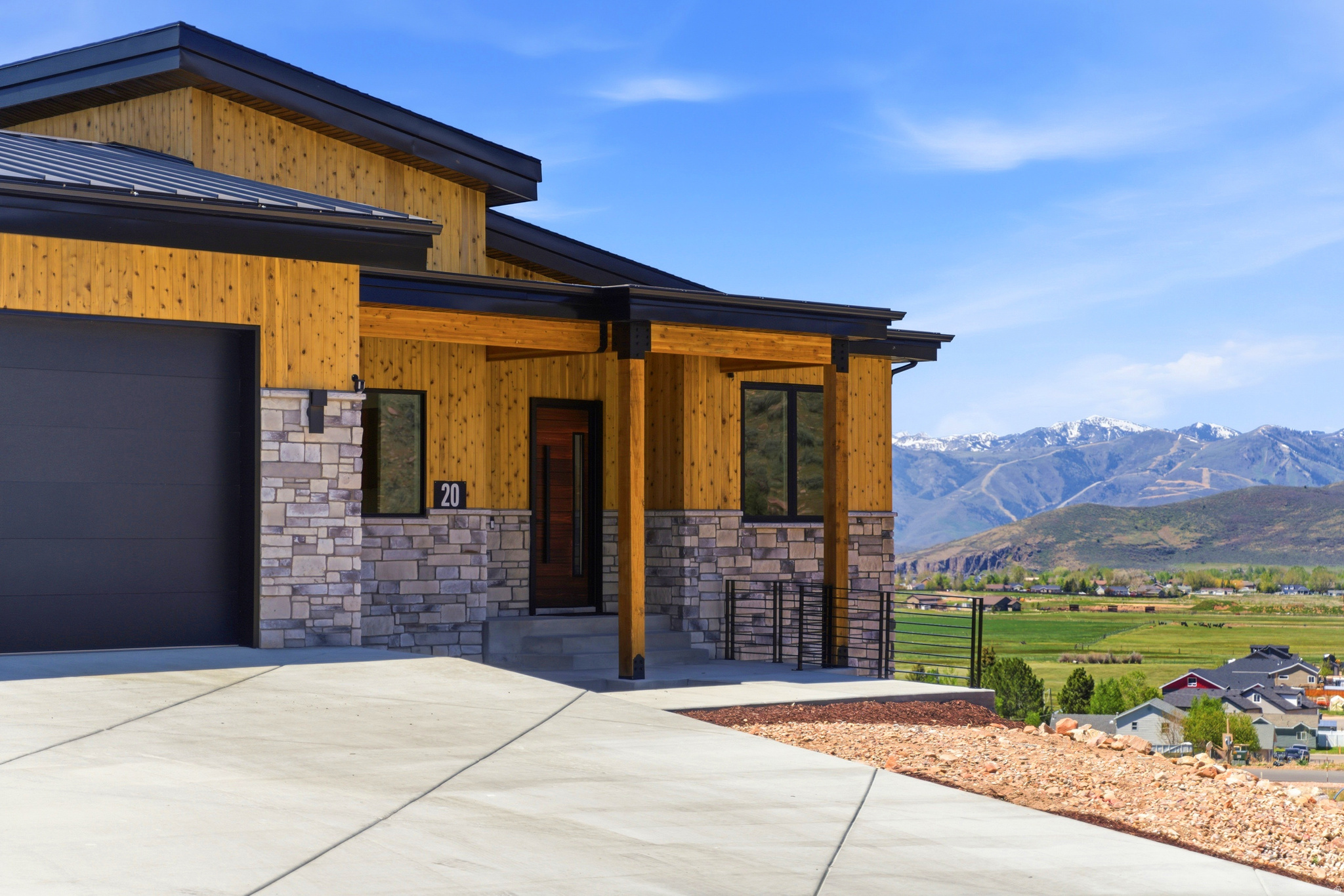 Discover refined mountain living in Foothills at Francis Gate, a brand-new community offering space, views, and connection to the outdoors--without sacrificing access to world-class amenities. This new construction, 5-bedroom mountain modern residence is thoughtfully designed to capture sweeping panoramic views stretching across Deer Valley, Park City, and Mount Timpanogos.  From inside the home, expansive windows frame a uniquely peaceful landscape: open rural pastures with grazing cattle in the foreground and dramatic mountain ranges rising beyond. It's a setting that delivers both serenity and a true sense of place.  The location strikes the perfect balance--just 20 minutes to Deer Valley East Village and 25 minutes to Park City, close enough to enjoy renowned skiing, dining, and events, yet far enough away to offer elbow room, privacy, and peace of mind. Just minutes away, the Gateway to the Uintas provides unmatched access to backcountry adventure, from hiking and biking to snowmobiling and skiing--an outdoor enthusiast's dream.  Experience a new chapter of mountain living in Foothills at Francis Gate--a place where modern design, open space, and spectacular views come together. Discover the community. Find your new home.