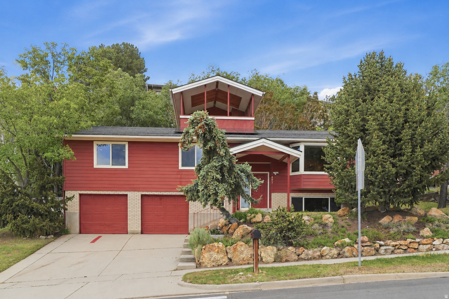 **OPEN HOUSE - Saturday 5/30 from 11-1:30pm**  Perched high in the coveted Avenues neighborhood, this gorgeous home offers breathtaking multimillion-dollar views, a private backyard, and a thoughtfully designed addition featuring a sunroom with a loft that leads to an incredible rooftop deck. This home is truly a rare gem! __ Inside, you'll find fresh paint throughout, new downstairs carpet, and a bright kitchen loaded with storage and generous counter space. Additional features include PAID-OFF solar panels, surround sound in multiple rooms, 2 fireplaces, 2 a/c units, 2 smart thermostats, a covered patio, invisible fence, rooftop deck, sunroom, loft, deep jetted soaking tub, bidet, and 4 spacious bedrooms. __ Looking for multi-generational living potential? The downstairs storage room already has a window and water access, making it an easy conversion for a galley-style kitchen setup. __ Love the outdoors and staying active? Ensign Park is conveniently located just across the street and is set below the road to help preserve those incredible views and features pickleball, basketball, soccer, cricket, and more. __ Enjoy easy access to neighborhood cafs, hiking trails, ski resorts, the University of Utah Hospital, downtown SLC, and the airport. __ Imagine hosting friends and family while taking in the sparkling SLC skyline and Utah's unforgettable sunsets. This is the perfect home for gathering, entertaining, and enjoying a truly spectacular setting. __ Buyer to verify all including square feet.