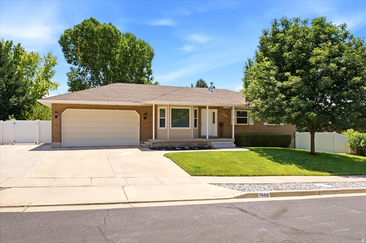 Pride of ownership shines throughout this beautifully maintained, custom-built " Original Owner" Rambler nestled on a quiet street in desirable East Layton, this exceptional home features 5 bedrooms, 3 bathrooms, and a thoughtfully designed floor plan perfect for everyday living and entertaining. The spacious, expanded fully remodeled kitchen has been beautifully updated and flows seamlessly into the  living area with a cozy fireplace. Rich hickory hardwood floors add warmth and timeless character. The fully finished daylight walkout basement offers an expansive family room with a wet bar-ideal for gatherings and celebrations. A gas line is already plumbed for a future kitchen, creating excellent potential for an ADU or mother-in-law apartment. Other Features include 2 large storage rooms, double furnace and C/A  (2018), updated triple pane windows, central vac, butlers pantry, as well as custom built-in storage spaces and crown moldings throughout the home. Outside, you'll find a private backyard oasis featuring a large 20 x 14 gazebo complete with lighting and electrical outlets, a sturdy swing set, mature shade trees, fruit trees, raspberry bushes, terraced flower gardens, a spacious lawn for play, a storage shed, and a fully fenced yard. Additional highlights include a 2-car garage, RV parking, paid-off solar panels for incredible energy savings and back up battery to power the entire home (installed 2022). This is a RARE opportunity to own an impeccably cared-for home located with easy access to Hwy 89, I-15, schools, shopping and numerous outdoor recreational opportunities. This beautiful home is Turn Key ready!