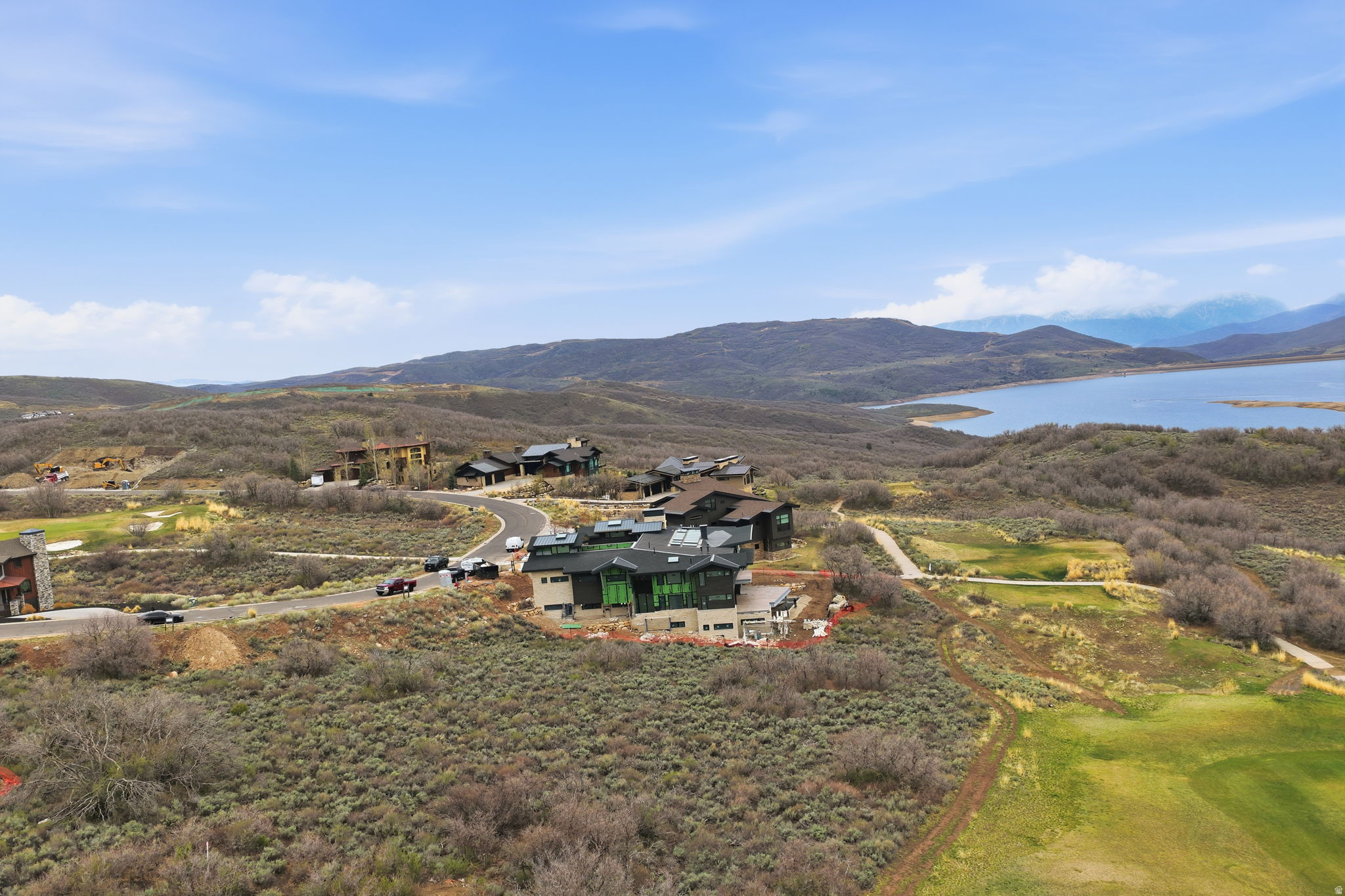 Discover an exceptional homesite in the heart of Hideout, offering rare, forever-protected panoramic views that are becoming increasingly difficult to find. Enjoy sweeping vistas overlooking the pristine golf course fairway, Jordanelle Reservoir, Mayflower Mountain Resort, and Deer Valley Resort-all with the assurance that no future development will obstruct your view.  Perfectly situated for year-round recreation and everyday convenience, this premier lot is just minutes from Mayflower, Deer Valley, and Park City, with easy access to Heber City, Salt Lake City, and Salt Lake City International Airport. Outdoor enthusiasts will appreciate immediate access to boating on Jordanelle and Deer Creek Reservoirs, world-class fly fishing on the Provo River, and endless opportunities for skiing, hiking, mountain biking, and more.  To make the building process even more seamless, fully approved architectural plans are available for purchase with the property, offering a significant head start on creating your custom mountain retreat.  Combining protected views, an unbeatable location, and an exceptional mountain lifestyle, this is one of Hideout's most desirable remaining homesites.  Square footage figures are provided as a courtesy estimate only.  Buyer is advised to obtain an independent measurement.