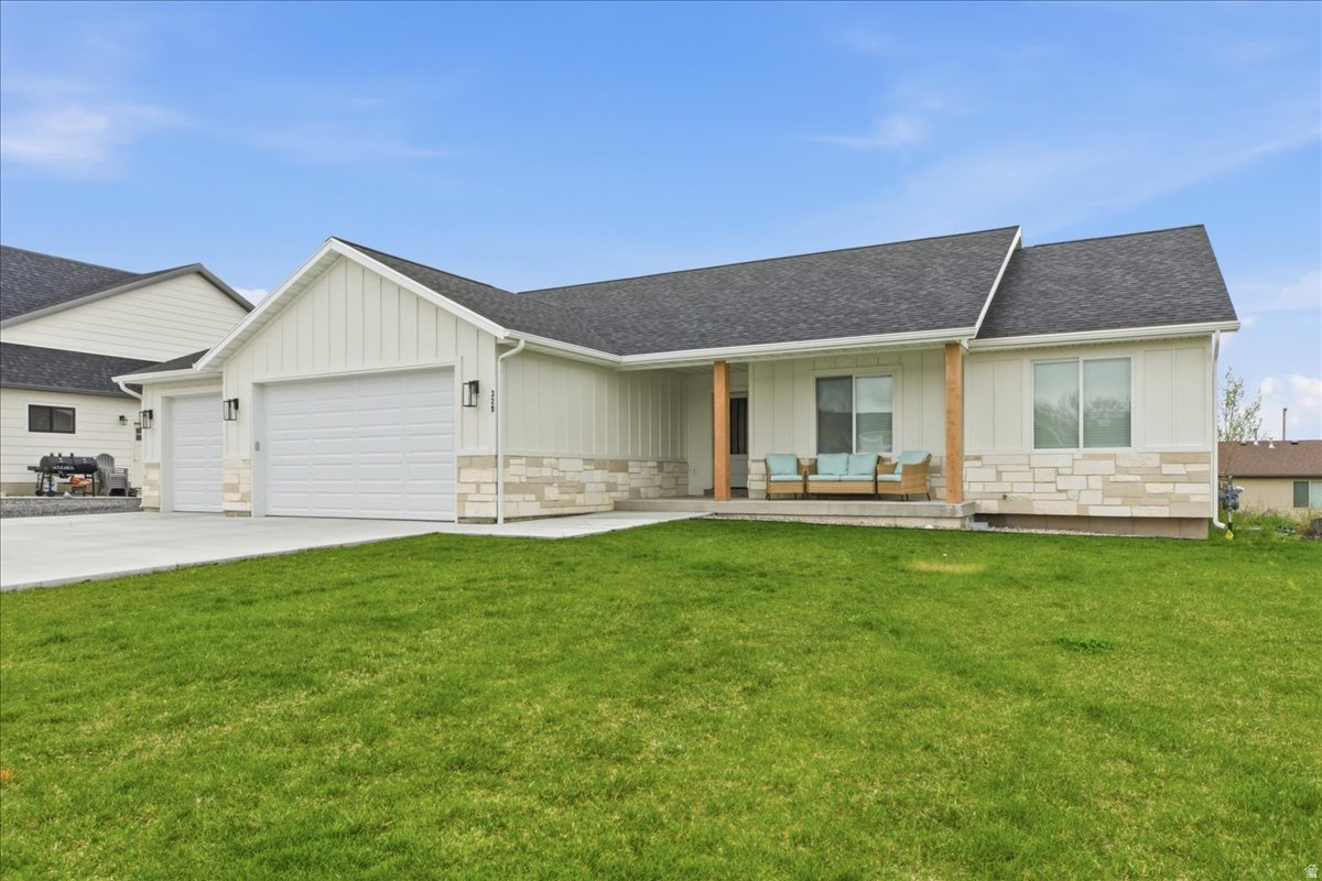 Gorgeous custom home in the growing community of Richmond. This 3-bedroom, 2-bathroom home features LP SmartSide siding, engineered hardwood flooring, quartz countertops, and beautifully glazed knotty maple cabinets. The spacious kitchen includes a walk-in pantry with counter-height storage and power-perfect for small appliances-as well as a range hood that vents to the exterior. The owner's suite offers a walk-in closet and a luxurious bathroom with cultured marble finishes. An unfinished basement provides room to grow, while the 3-car garage with insulated doors offers ample storage. You'll appreciate the open layout, custom finishes, and quality craftsmanship throughout this nearly new home.