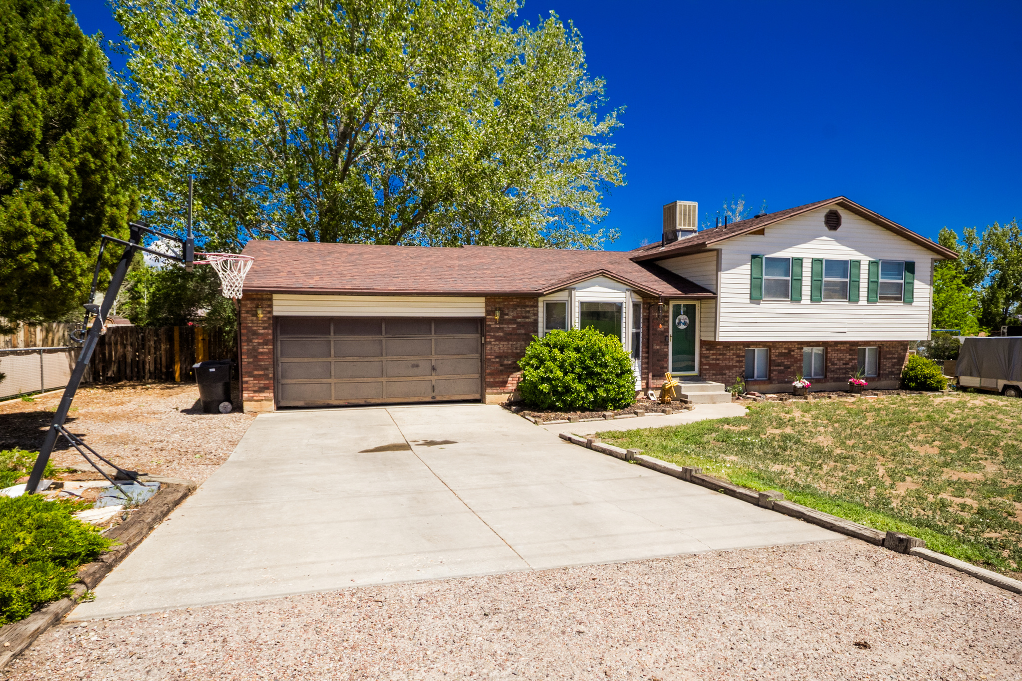 Welcome to this 4 bedroom, 3 bathroom home located in a great neighborhood in Vernal! Situated on .37 acres, this property offers plenty of space both inside and out. The home features a functional layout with comfortable living areas, spacious bedrooms, and room for the whole family. The large yard provides endless possibilities for entertaining, relaxing, or creating your own outdoor space. Square footage figures are provided as a courtesy estimate only and were obtained from County Records.  Buyer is advised to obtain an independent measurement. Buyer and Buyer's Agent to verify all information.