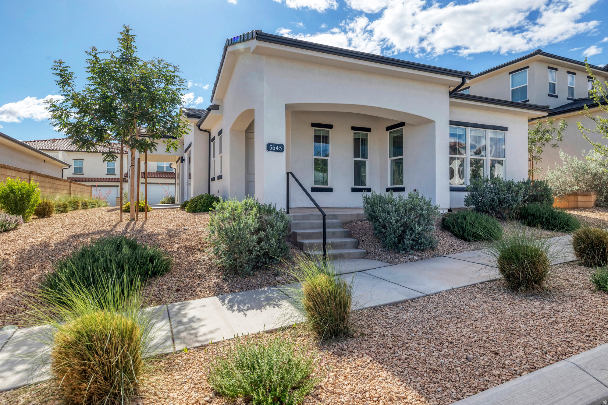 Located in the highly sought-after Desert Color community in St. George, this beautiful home offers the perfect blend of comfort, recreation, and modern desert living. Featuring 3 spacious bedrooms, 3 full bathrooms, and a 3-car garage, this property is designed with both functionality and style in mind. Enjoy all the incredible amenities Desert Color has to offer, including access to resort-style pools, pickleball courts, and the stunning lagoon complete with sandy beaches - giving you a vacation lifestyle right at home. Conveniently located just down the road from Costco Wholesale, Smiths Marketplace, BigShots Golf St. George, a soon-to-be-built Megaplex theater, Swig, and several popular fast food and dining options, you'll have entertainment, shopping, and dining all within minutes of your doorstep.