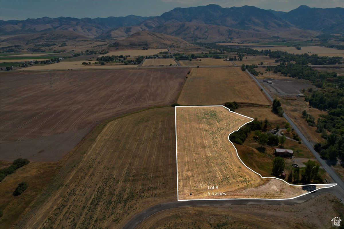 Welcome to Cub River Estates where you have room to breathe. This 5.5 acre lot in peaceful Cove, Utah offers fertile ag ground, secondary water and stunning views. Ideal for a custom home with a shop, garden or animals, just 15 minutes from Cherry Peak.
