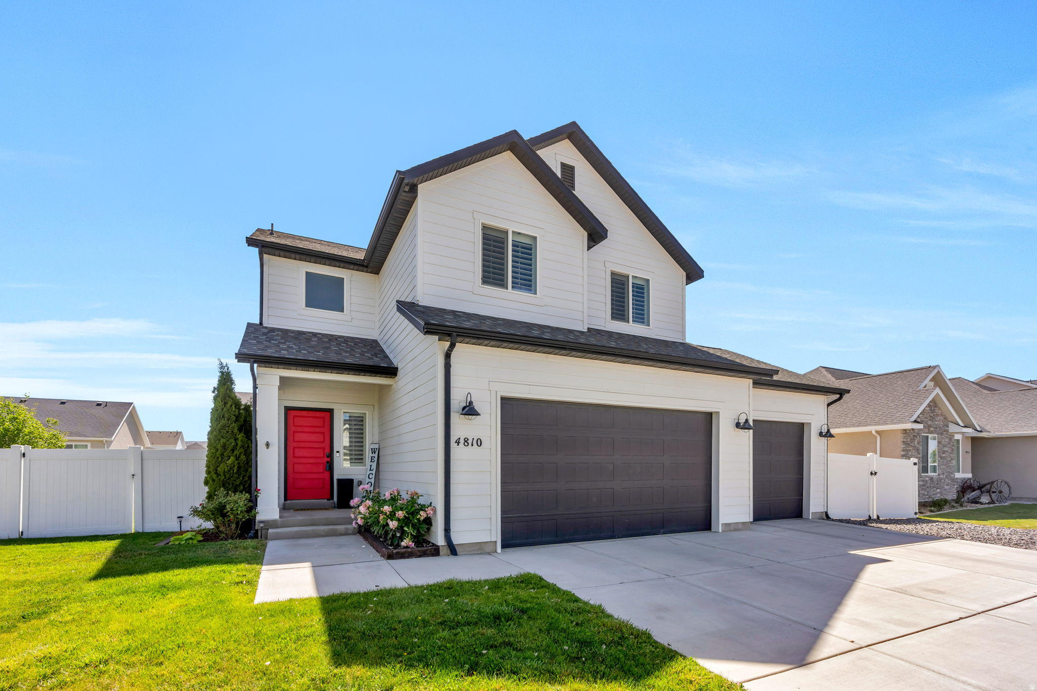 No HOA, RV parking, a 3-car garage, and a spacious backyard deck make this Eagle Mountain home a rare find for buyers who need flexibility, storage, and room to grow.  Inside, this 2,859-square-foot home offers a bright, open main level with upgraded laminate flooring, a clean kitchen and dining flow, and a newly installed custom entertainment center that anchors the living space. Upstairs, the primary suite has been upgraded with a brand-new walk-in shower, giving the home a more polished and move-in-ready feel.  The unfinished lower level has framing already in place, giving the next owner a clear path to add more bedrooms, living space, storage, or a home gym. Outside, the flat backyard, large deck, side RV parking, and extra-height three-car garage give this property the kind of practical usability that is hard to find, especially without HOA restrictions.