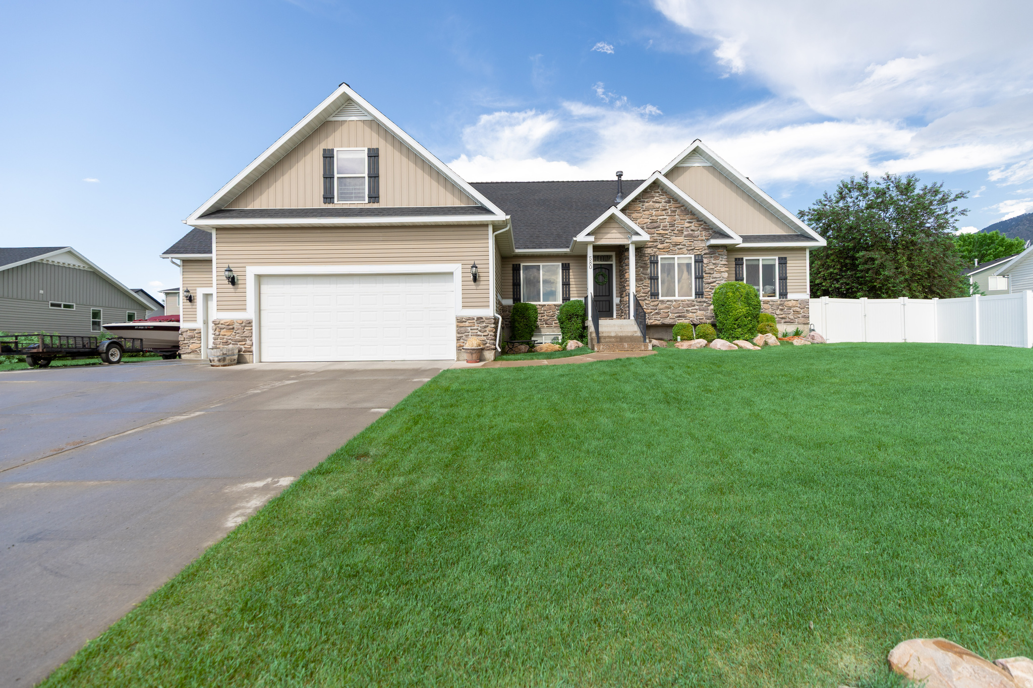 [Richmond Black and White Days Special! Seller is offering a $10,000.00 reduction from purchase price.  Offer must be submitted and accepted by May 28th.  Contract must close on or before July 7, 2026].  Perched on the picturesque east bench of Richmond, this charming 2-story home offers the perfect blend of comfort and luxury. With 9 bedrooms, 4 and a half bathrooms, and a fully finished basement, there's room for everyone-and everything as well as personal space, and even dropdown stairs for more storage in the attic access!  Entertain effortlessly in the theatre room, or gather in the open-concept living spaces that flow beautifully throughout the home. The 3-car garage provides ample space for vehicles, storage, or even your weekend toys. Whether you're hosting family, working from home, or just enjoying the peace and views Richmond is known for, this home has the space and features to support every lifestyle.