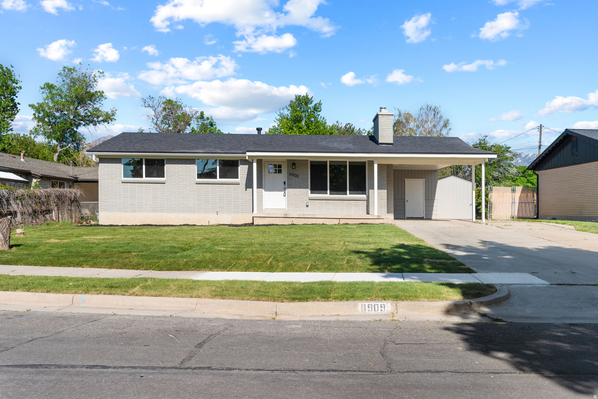 VACANT, CALL OR TEXT AGENT FOR CODE. Beautifully remodeled home that has been completely re-done walls in.  Kitchen has all new cabinetry with granite counters, tile back splash, ss appliances. Enjoy new electrical, plumbing, roof, windows, flooring, paint, doors, trim etc.  Enjoy all new bathrooms with so much style and custom finishes.  Basement boasts tall ceilings, huge bedrooms, and a large, beautifully done all new bathroom.  So close to shopping, freeway access yet still maintains a wonderful neighborhood feel.  Check out the photos.
