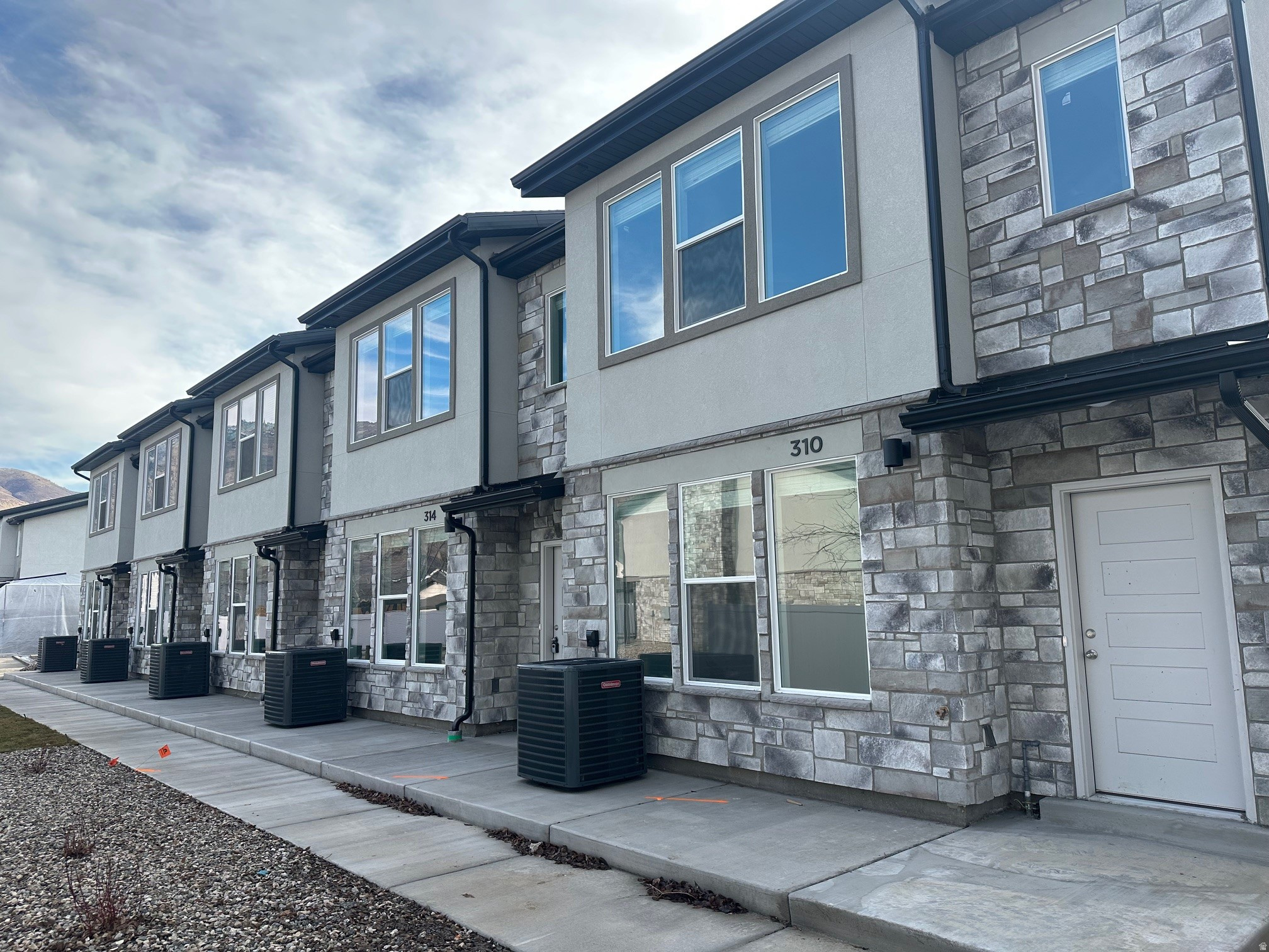 This beautifully designed 3 bed, 2.5 bath townhome is part of a new construction community located near parks, schools, and all the charm Ogden has to offer. These homes feature spacious open layouts, stylish finishes, 2-car garages. 9 ft ceilings on main level and Master Suite.  Come tour a finished unit to see the quality craftsmanship and secure your new home before they're gone! Special Incentives Available! Qualified first-time homebuyers may be eligible for a $20,000 New Build Grant covering down payment and closing costs. Photos are of a previously completed townhome by the same builder and are for illustrative purposes only. Finishes, features, and layout may vary. Square footage figures are provided as a courtesy estimate only and were obtained from build set. Buyer is advised to obtain an independent measurement.